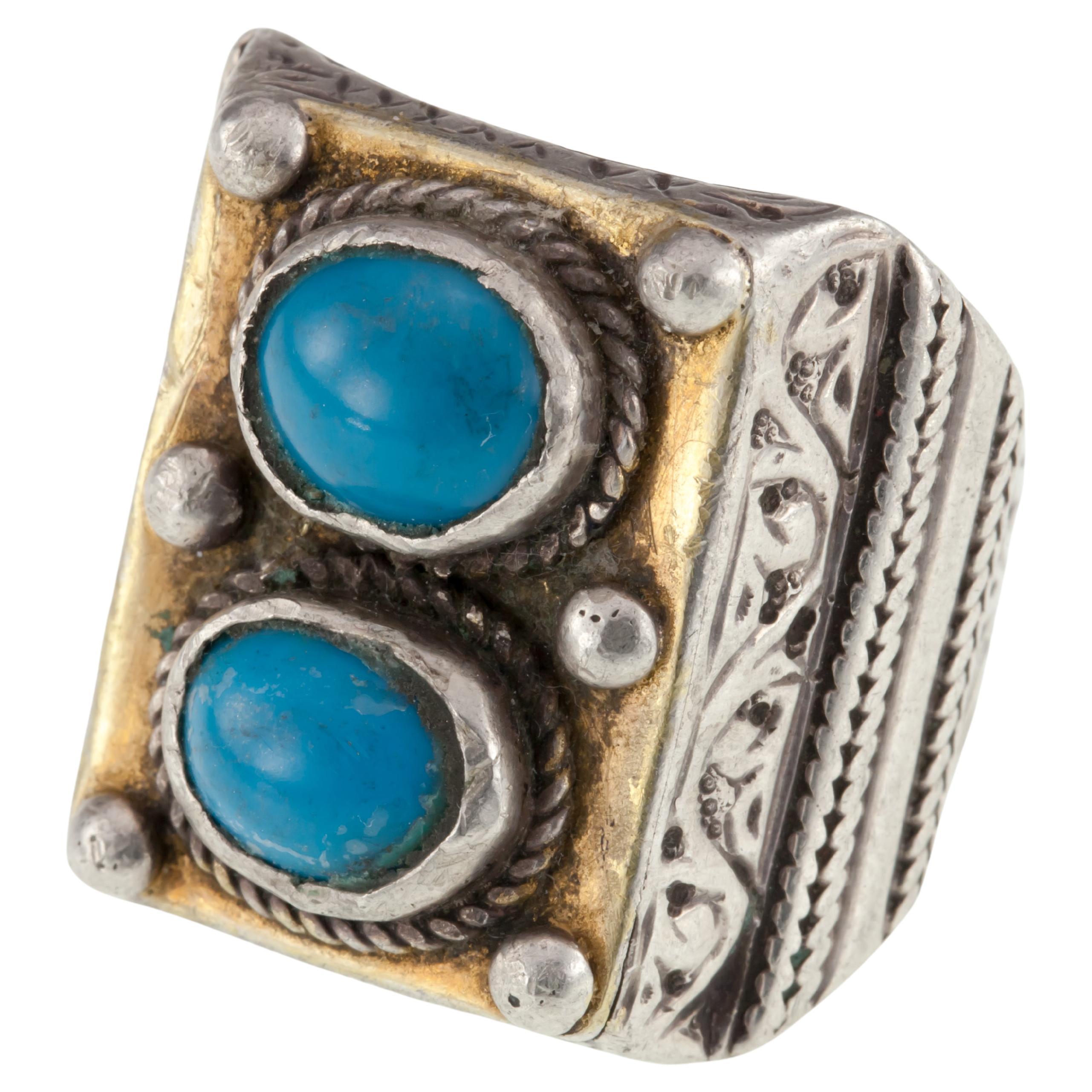 Bague vintage afghane en argent et laiton avec cabochon de turquoise