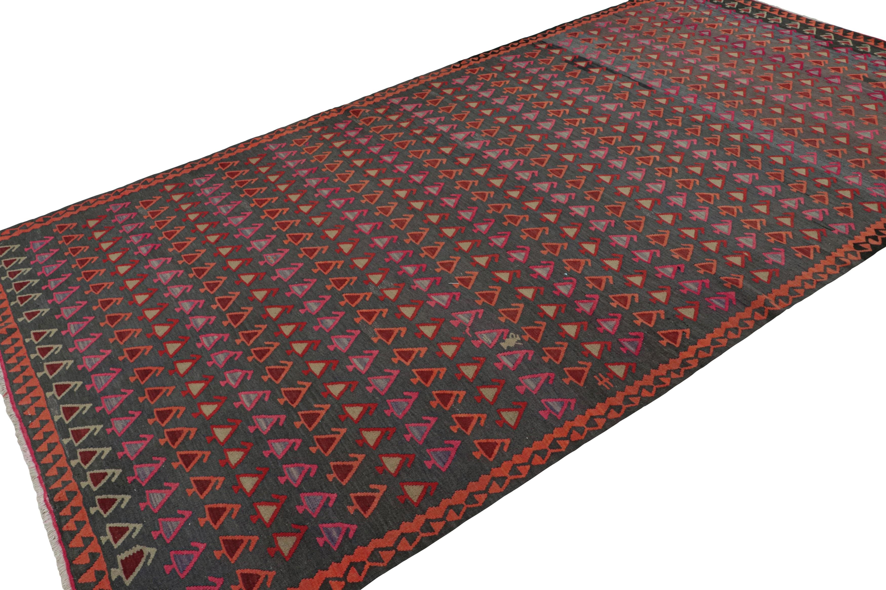 Handwoven in wool circa 1950-1960, this 6x12 vintage Afghan kilim is a new curation from Rug & Kilim’s collection. 

On the Design:

Specifically believed to be coming from tribal weavers, this 6x12 flatweave boasts a rich personality with