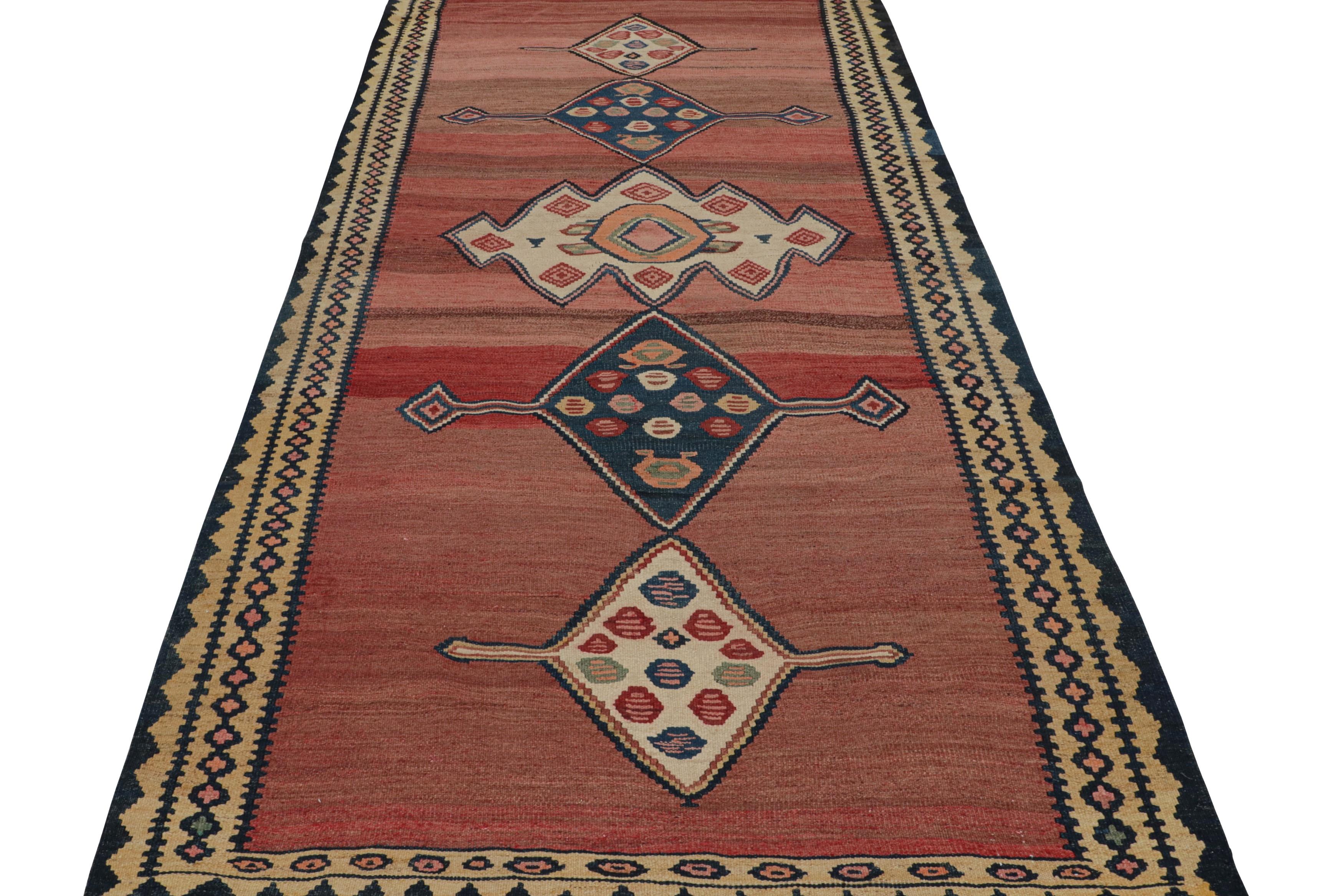 Hand-Woven Vintage Afghan Tribal Kilim in Red with Polychromatic Patterns by Rug & Kilim For Sale