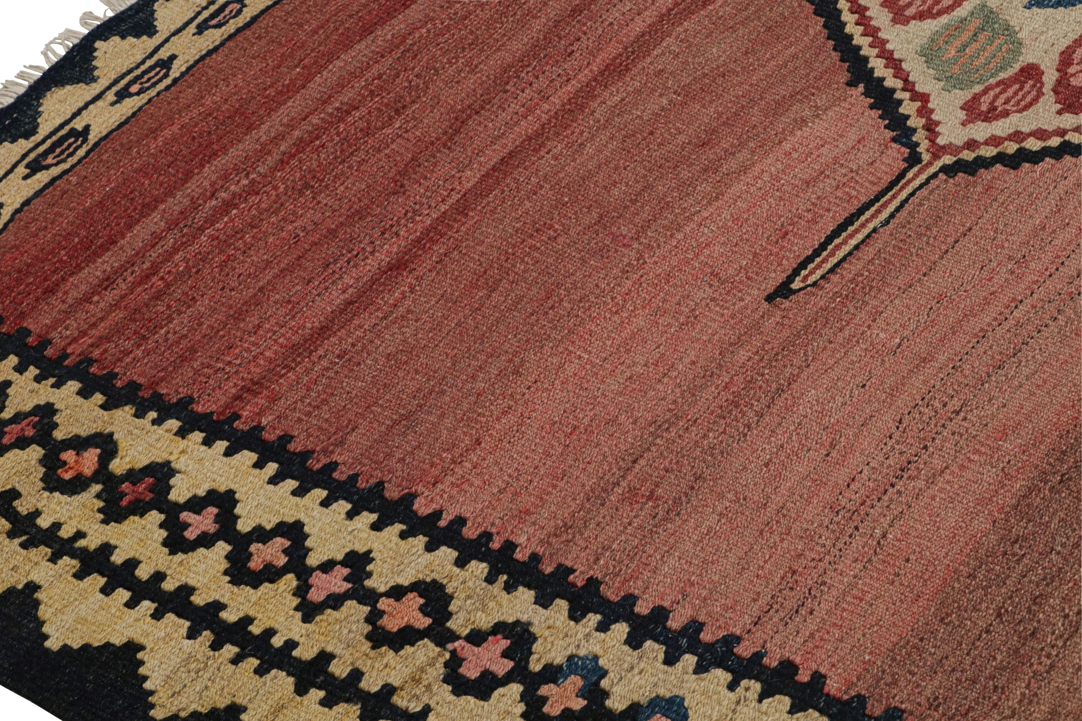 Mid-20th Century Vintage Afghan Tribal Kilim in Red with Polychromatic Patterns by Rug & Kilim For Sale