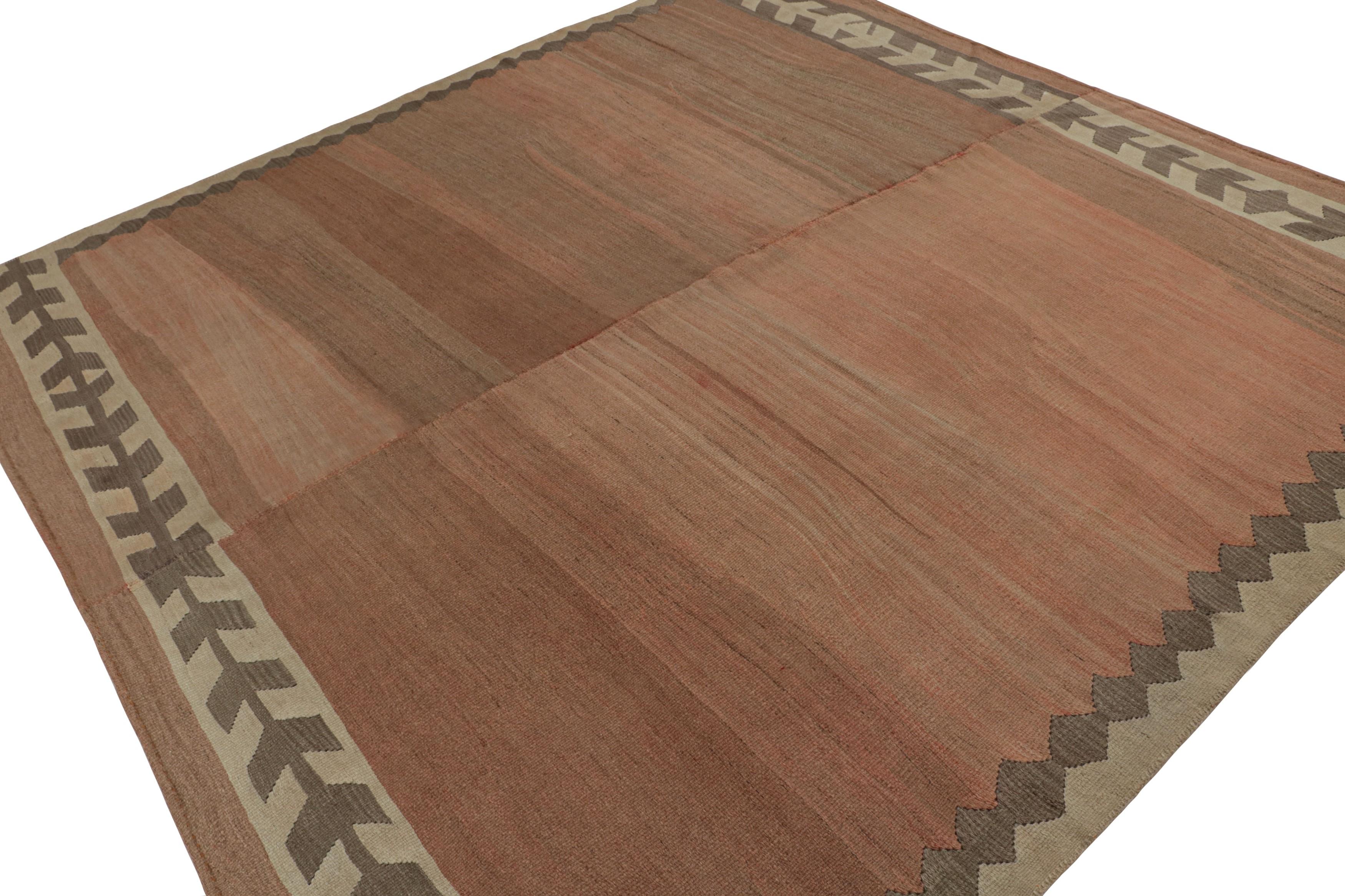 Handwoven in wool circa 1950-1960, this 9x9 vintage Afghan kilim is a new curation from Rug & Kilim’s collection. 

On the Design:

This particular rare piece enjoys a rich brown open field with an extremely minimal border. The constitution embraces