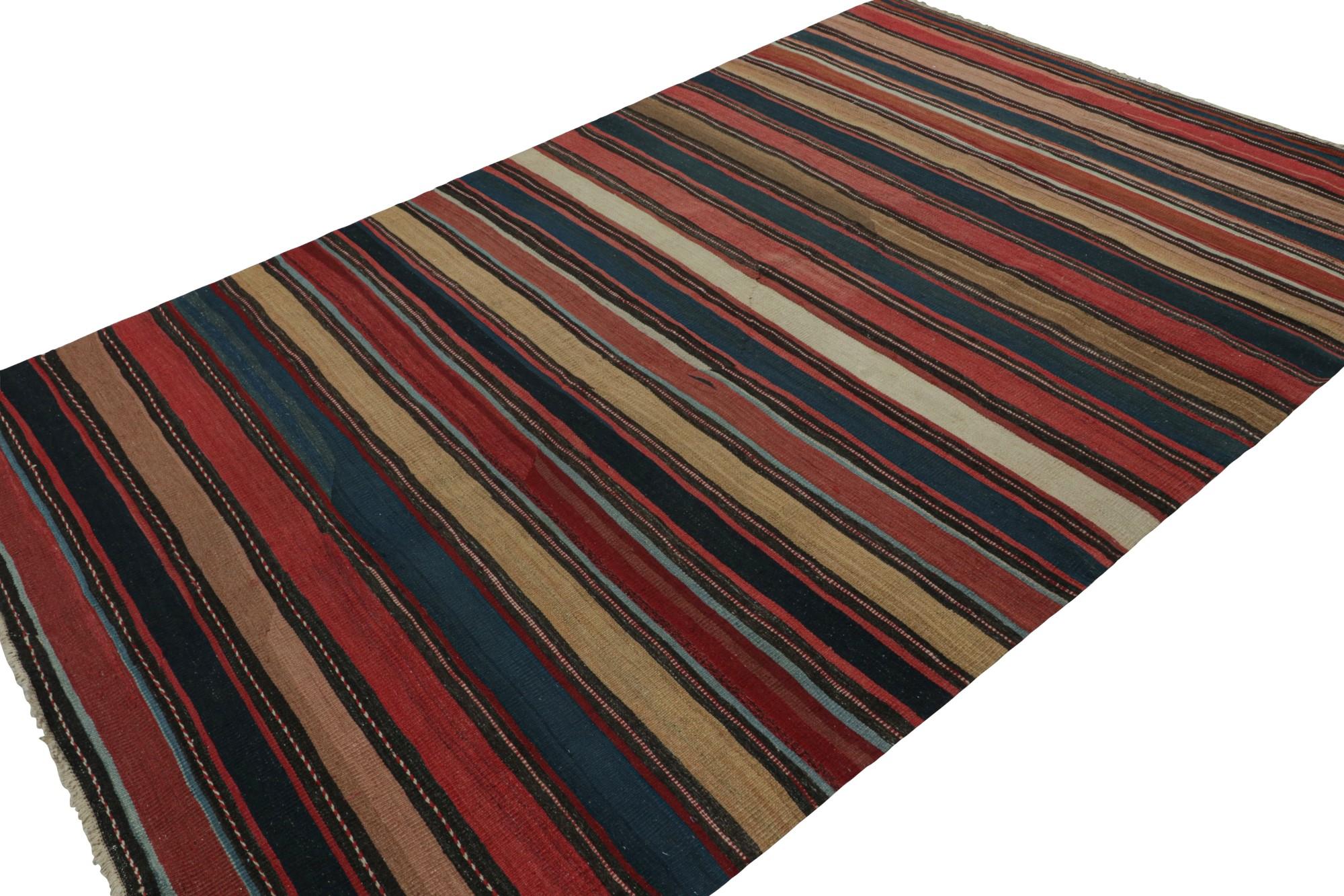Hand knotted in wool, this 6x10 Afghan tribal kilim rug is an extraordinarily simple piece with colorful stripes and a simple presence. 

On the Design: 

The minimalist design prefers geometric stripes in rich beige/brown, blue and red with gray