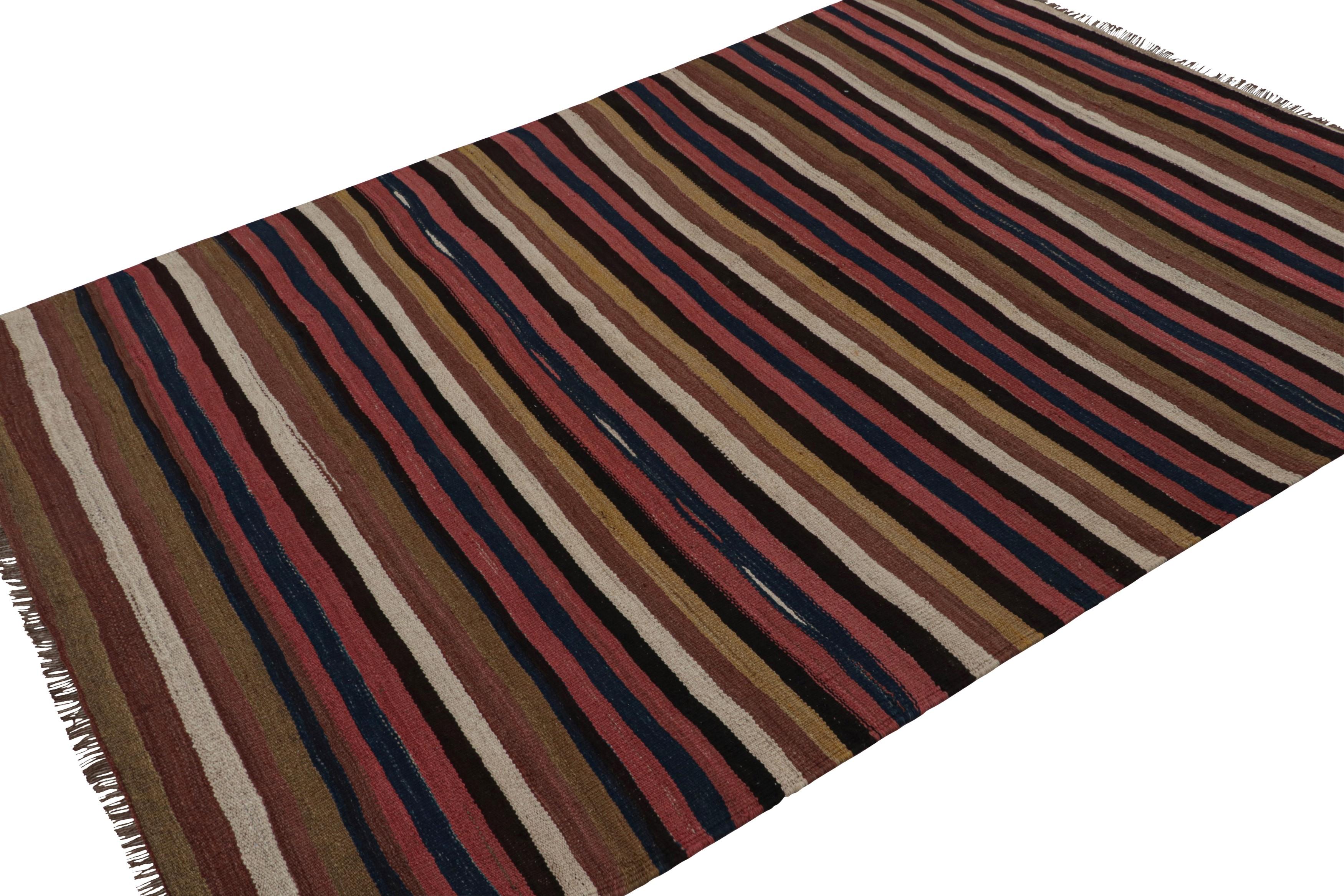 Handwoven in wool, circa 1950-1960, this 6x8 vintage Afghan tribal kilim rug, with stripes in red, silver/gray, beige/brown, and blue, is from Afghanistan. 

On the design: 

Connoisseurs will appreciate this kilim featuring the signature design of