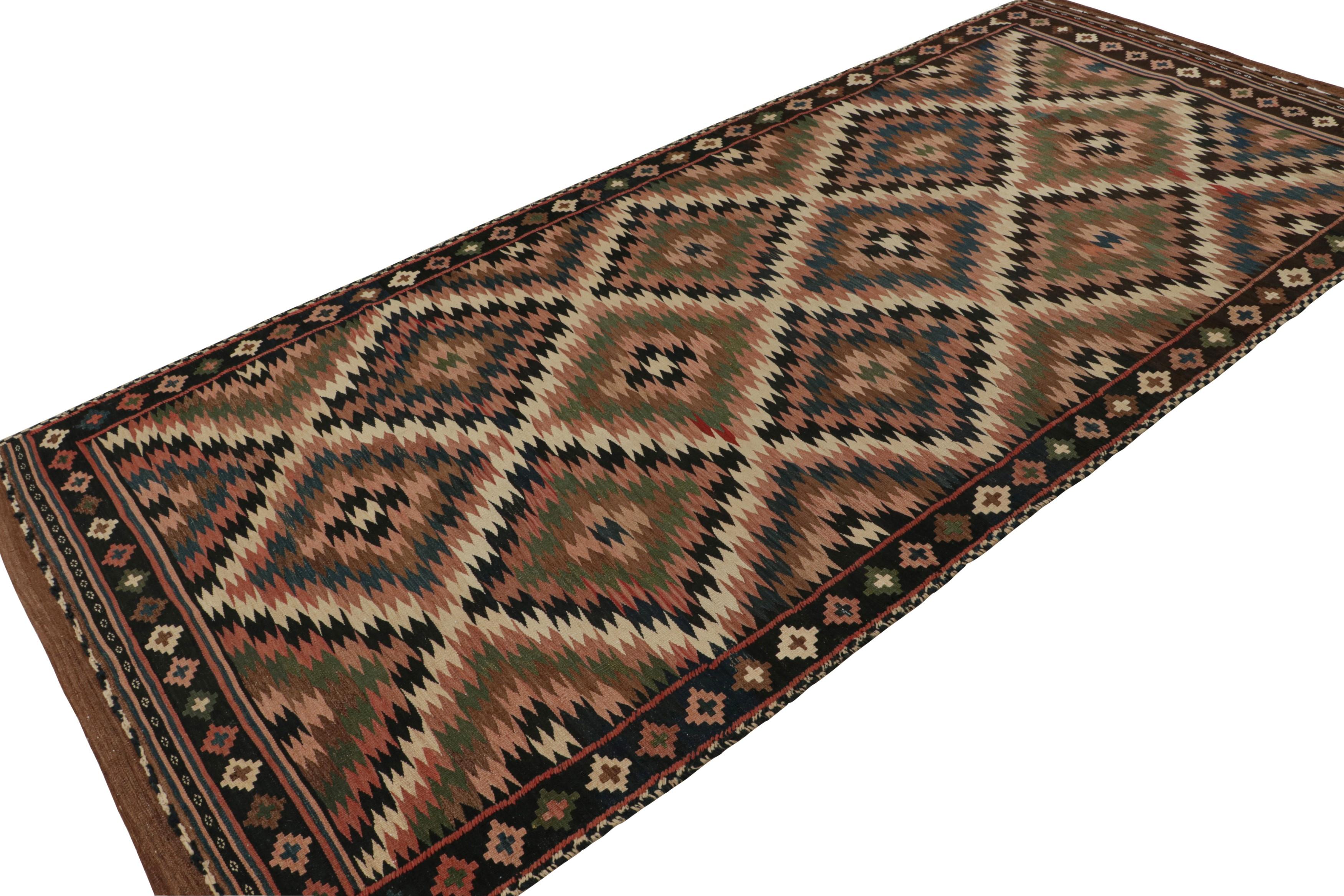 Handwoven in wool circa 1950-1960, this 6x12 vintage Afghan kilim is a new curation from Rug & Kilim’s collection. 

On the Design:

Specifically believed to be coming from tribal weavers, this 6x12 flatweave boasts a rich personality with