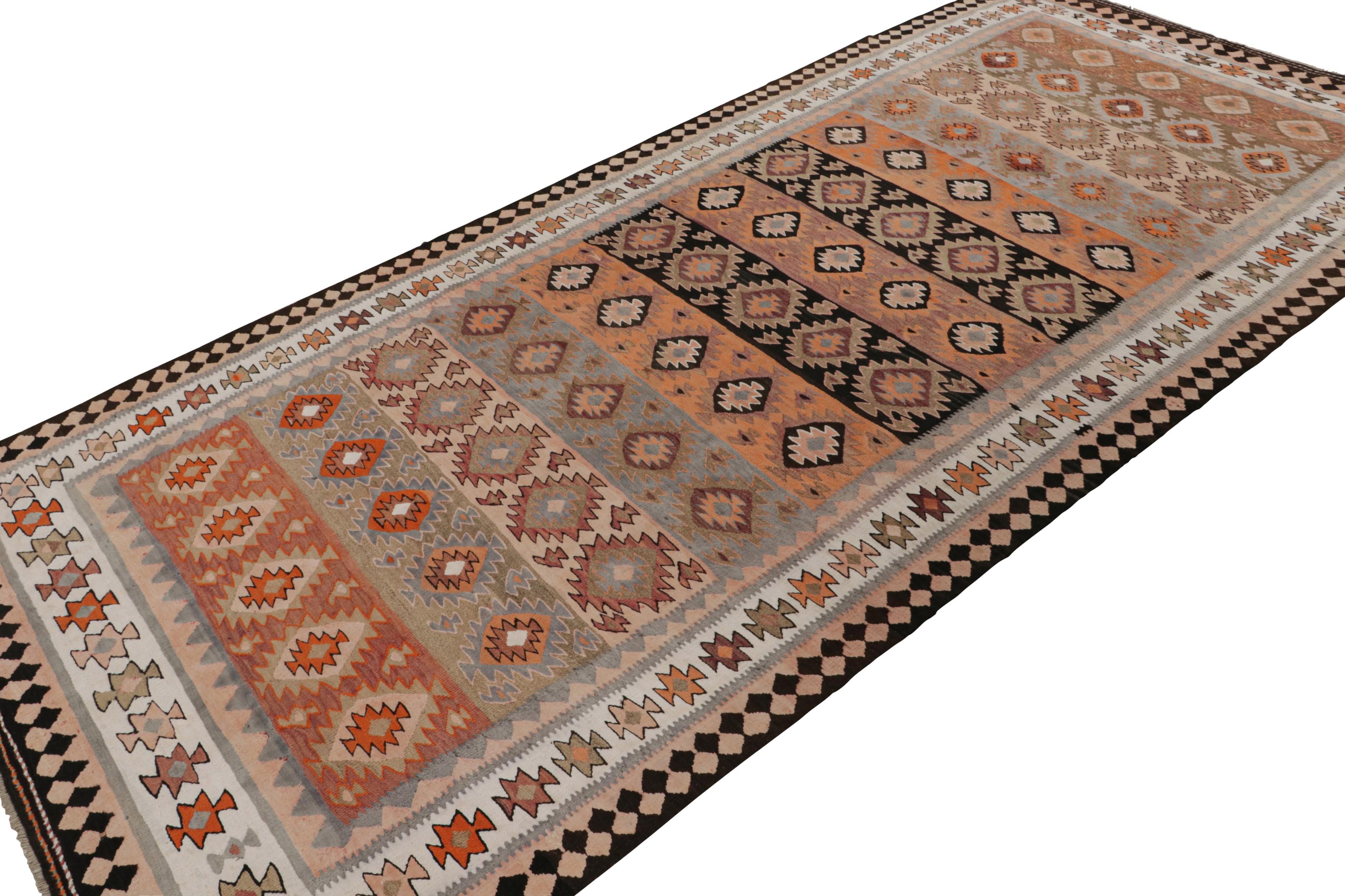 Handwoven in wool circa 1950-1960, this 5x12 vintage Afghan kilim is a new curation from Rug & Kilim’s collection. 

On the Design:

Specifically believed to be coming from tribal weavers, this 5x12 flatweave boasts a rich personality with