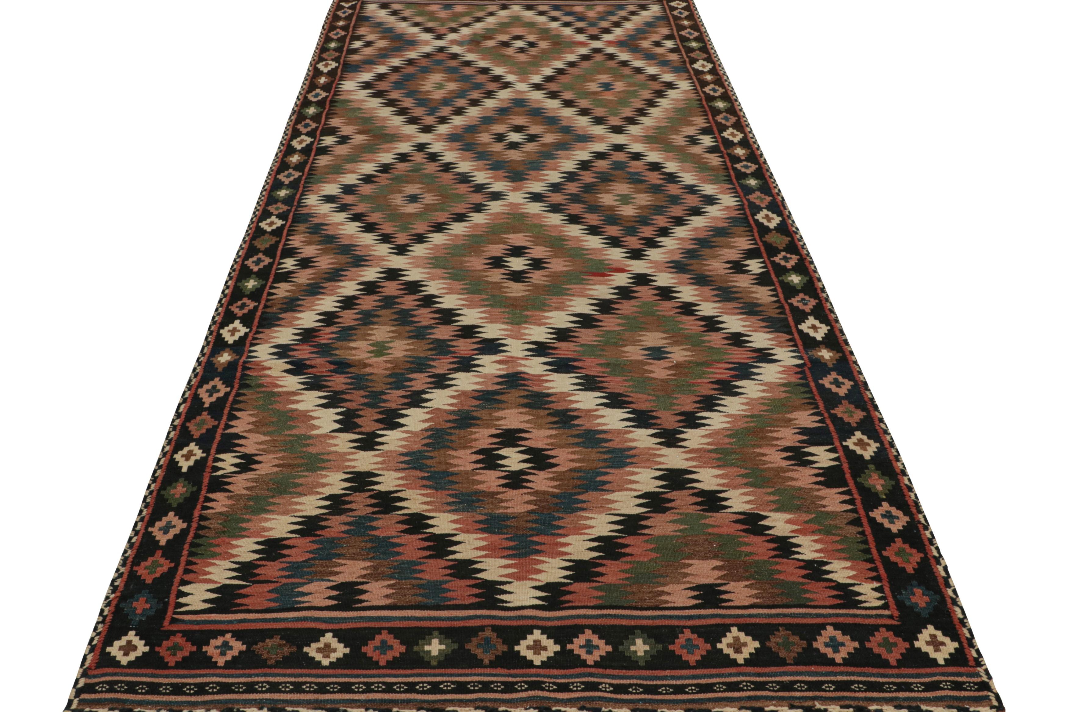 Hand-Woven Vintage Afghan Tribal Kilim with Polychromatic Patterns by Rug & Kilim For Sale