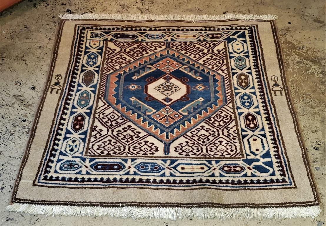 Handmade in the Tribal North of Afghanistan, the 2 figures on the borders indicate the tribe that made this prayer rug.

Early 20th century, circa 1920. Made of wool.

Square shape. Very tight weaving and knotting.

In great condition. Near