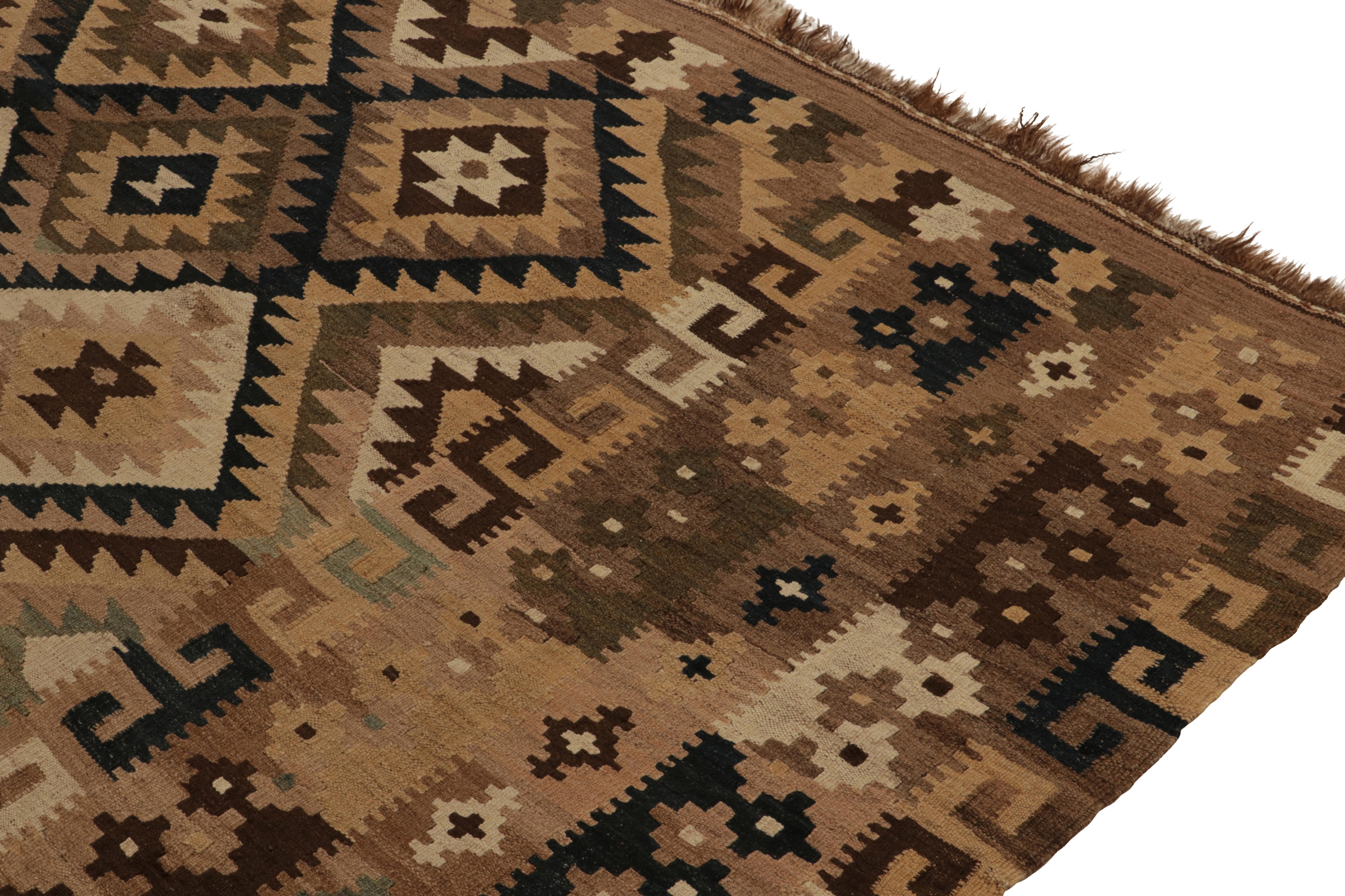 Mid-20th Century Vintage Afghani Kilim Rug in Beige-Brown, Black Tribal Pattern by Rug & Kilim For Sale
