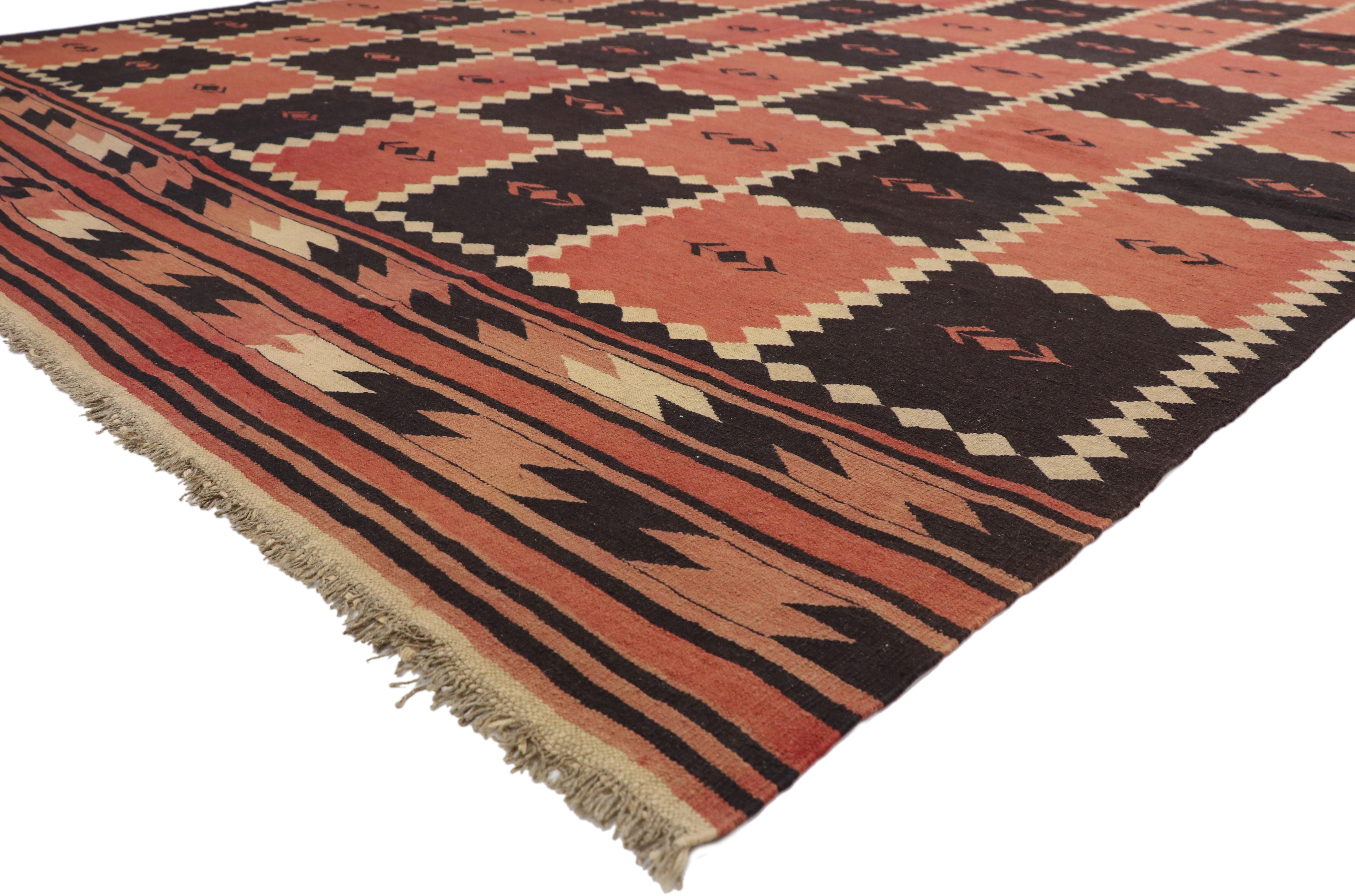 72071, vintage Afghani Kilim rug with Checkerboard Design and Modern Tribal style. Full of tiny details and a bold expressive checkerboard design combined with warm earth-tone colors, this hand-woven wool vintage Afghani Kilim rug is a captivating