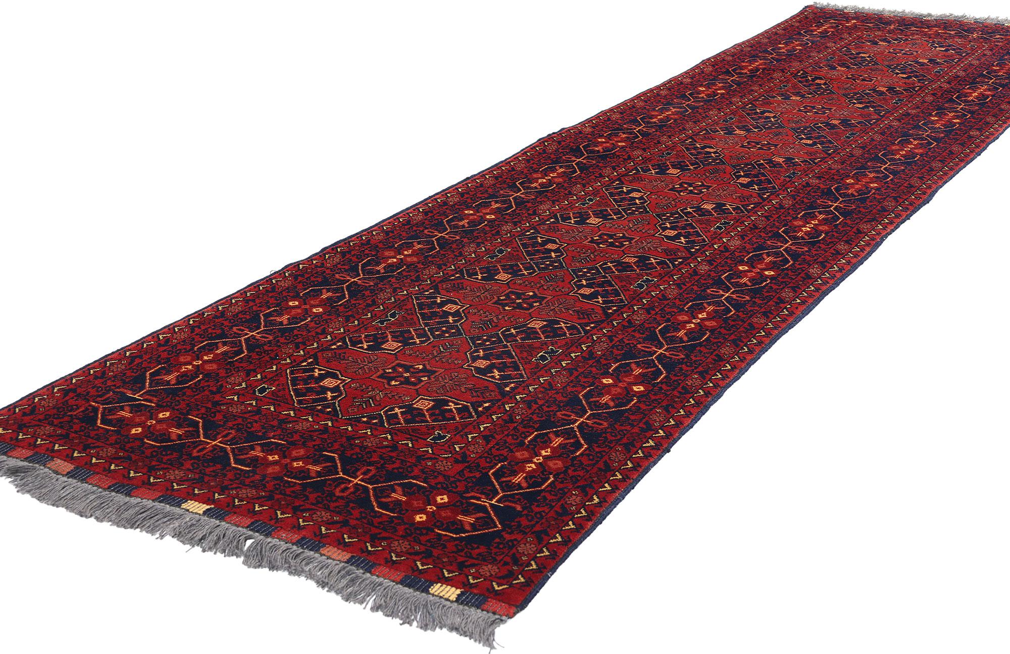 77009 Vintage Afghan Baluch Rug, 02'07 x 09'08. Afghan Baluch rugs are handwoven textiles originating from the Baluch tribes in Afghanistan. These rugs are characterized by intricate designs, geometric patterns, and earthy colors such as red, blue,