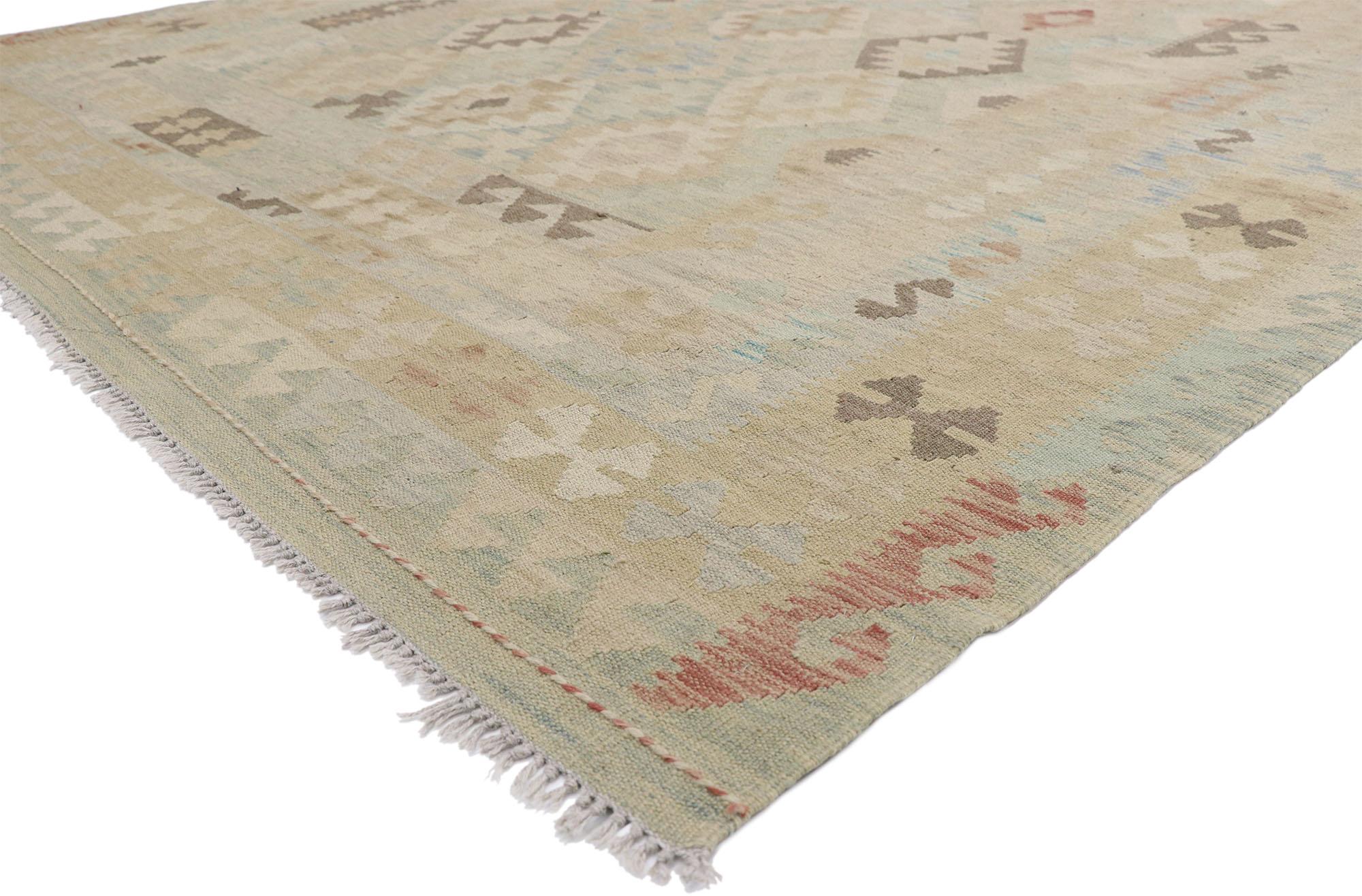 80118 Vintage Afghani Kilim Rug, 06'08 x 09'09. In this handwoven wool vintage Afghan kilim rug, Contemporary Santa Fe Design intertwines with Organic Modern style, forming a harmonious fusion that pays homage to the rich cultural heritage of Santa