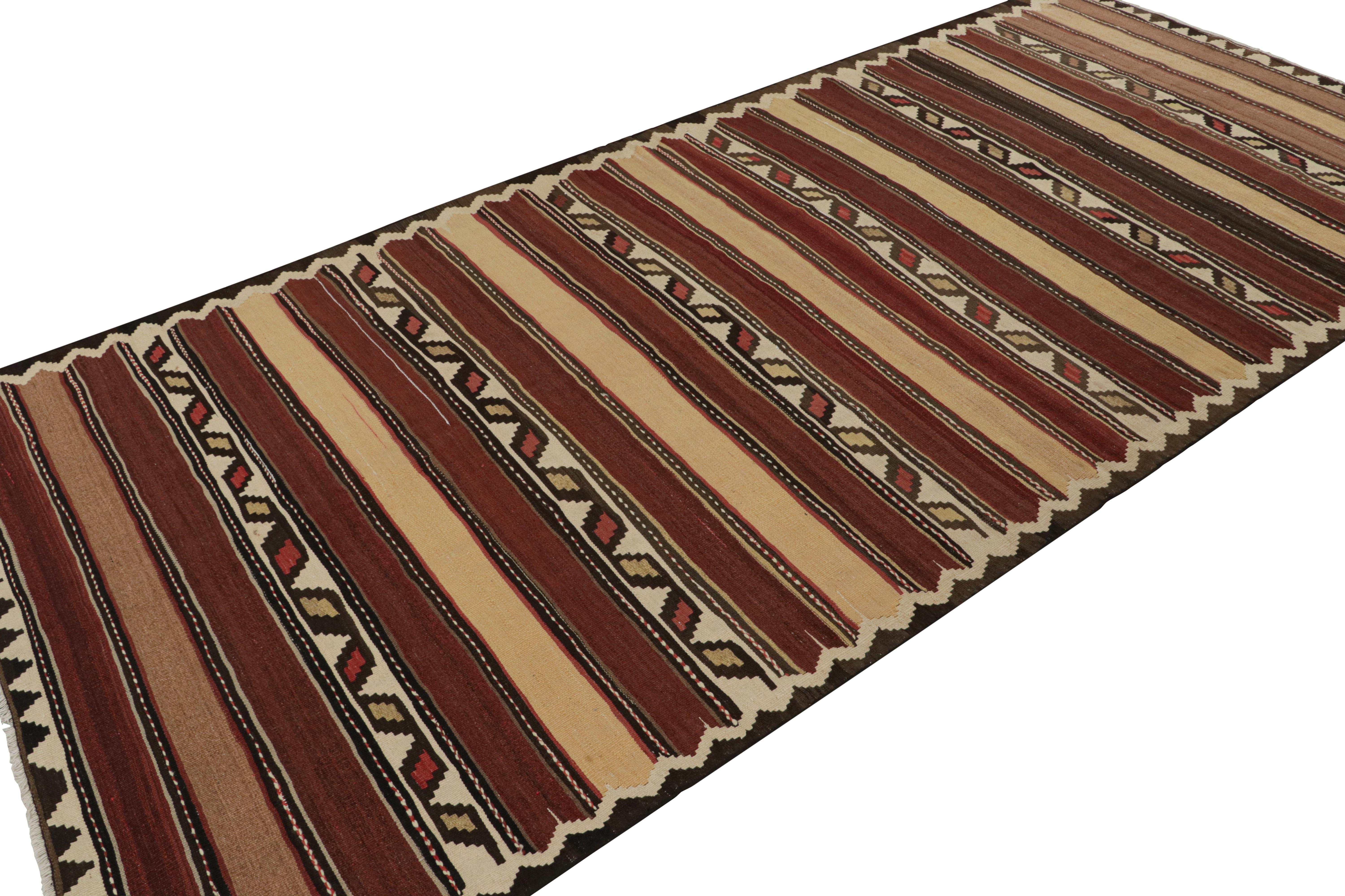 Handwoven in wool, circa 1950-1960, this 5x11 vintage Afghan tribal kilim rug, is an exciting new curation in the Rug & Kilim collection. 

On the Design: 

Connoisseurs will admire the striped pattern of this design, which is reflective of