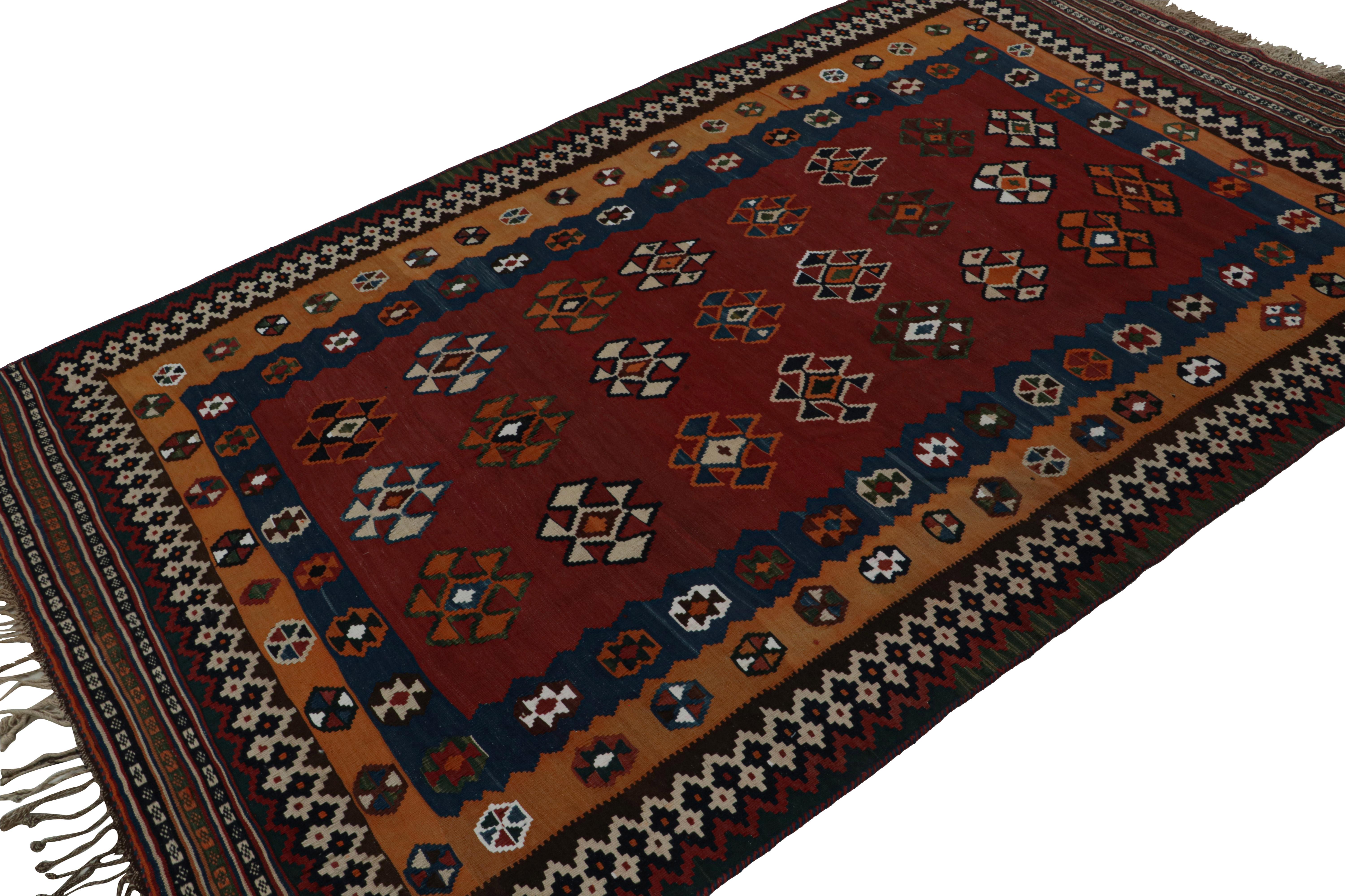Handwoven in wool, circa 1950-1960, this 5x9 vintage Afghani tribal Kilim rug, with geometric patterns, is a special curation in the Rug & Kilim collection. 

On the design: 

A special curation in the Rug & Kilim collection, this rug showcases an