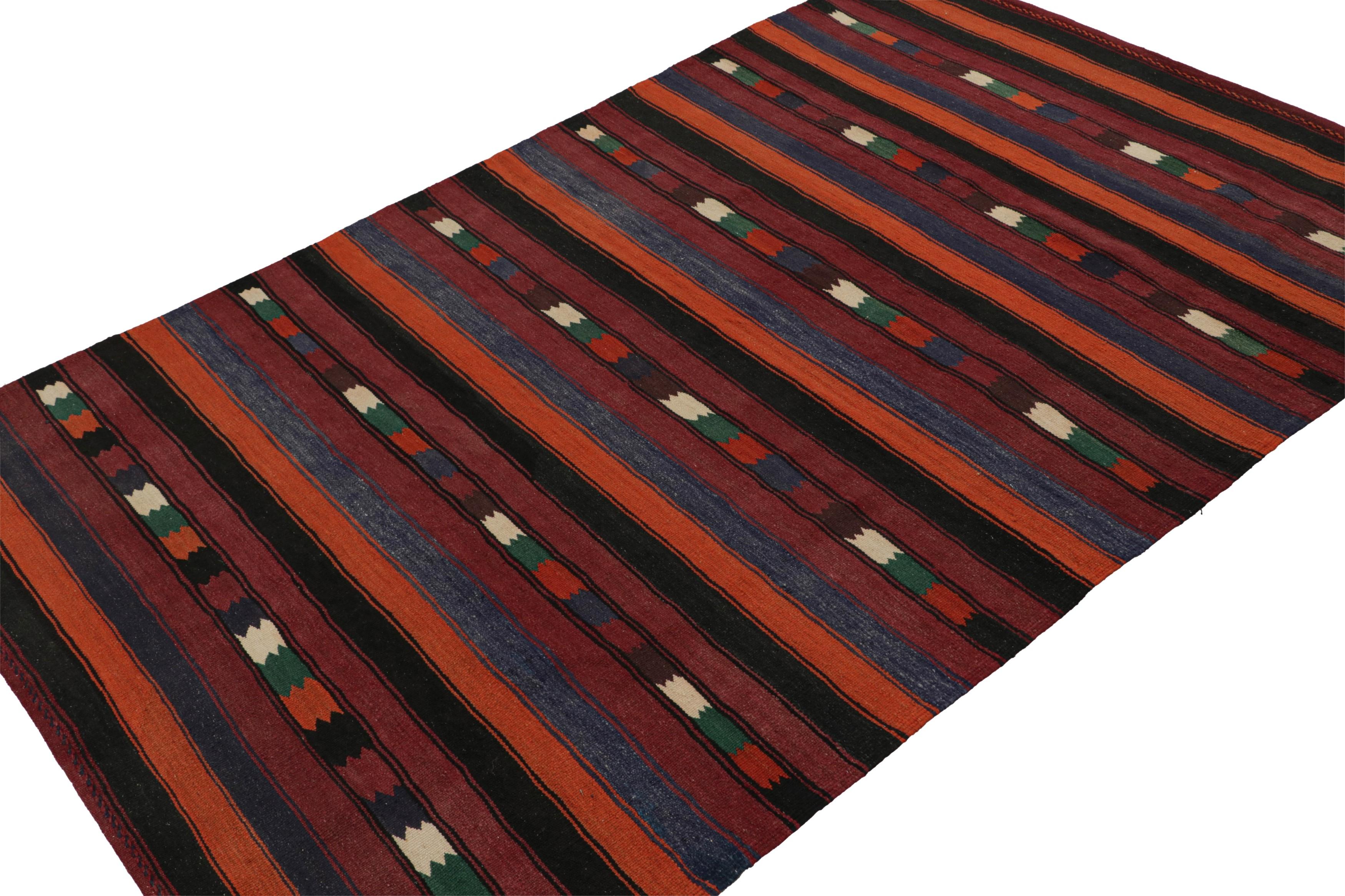 Handwoven in wool, circa 1950-1960, this 5x7 vintage Afghan tribal kilim rug seems to draw on Karabagh Kilims and similar Persian tribal provenances that favor such a play of rich and playful tones. 

On the Design: 

Drawing on Karabagh Kilims and