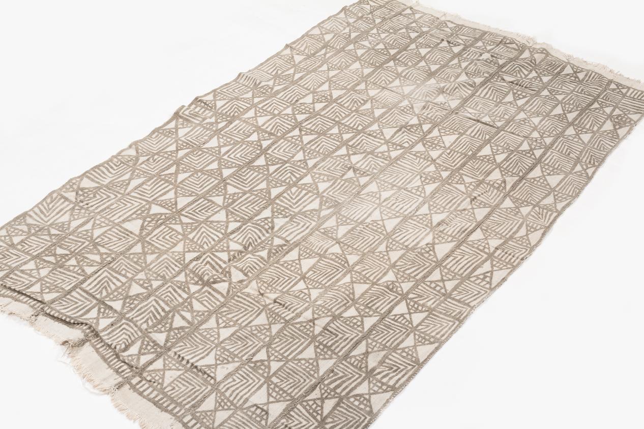 This mud cloth was made circa 1980s and was made from handwoven strips of cotton. This mud cloth comes from Mali and made by the Bamana tribe. Great hand-spun cotton and wonderful patterning. Measures: 2'10'' x 5'.