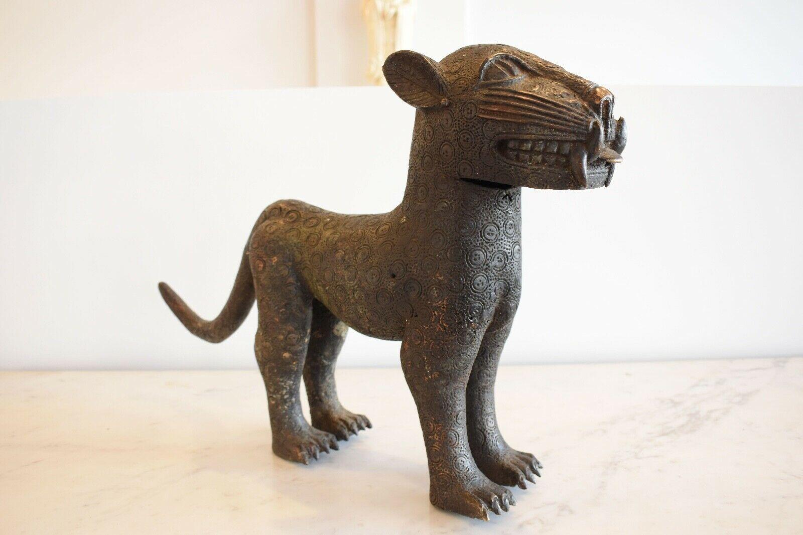 A vintage Benin bronze leopard. 
This piece of west African art is a great decorative addition to any home. 


 