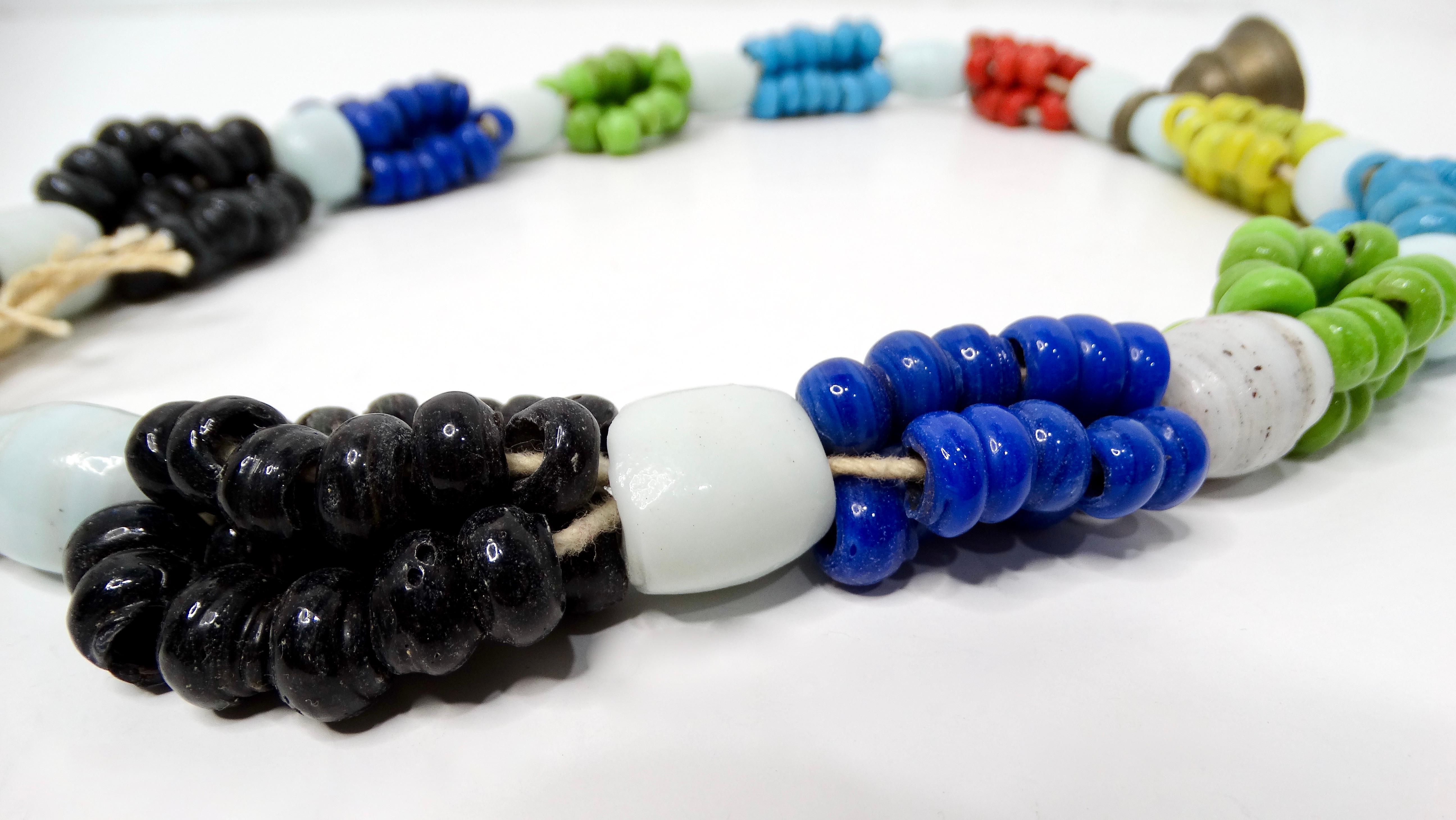 Women's or Men's Vintage African Handmade Tribal Multicolor Glass Beaded Necklace With Bell For Sale