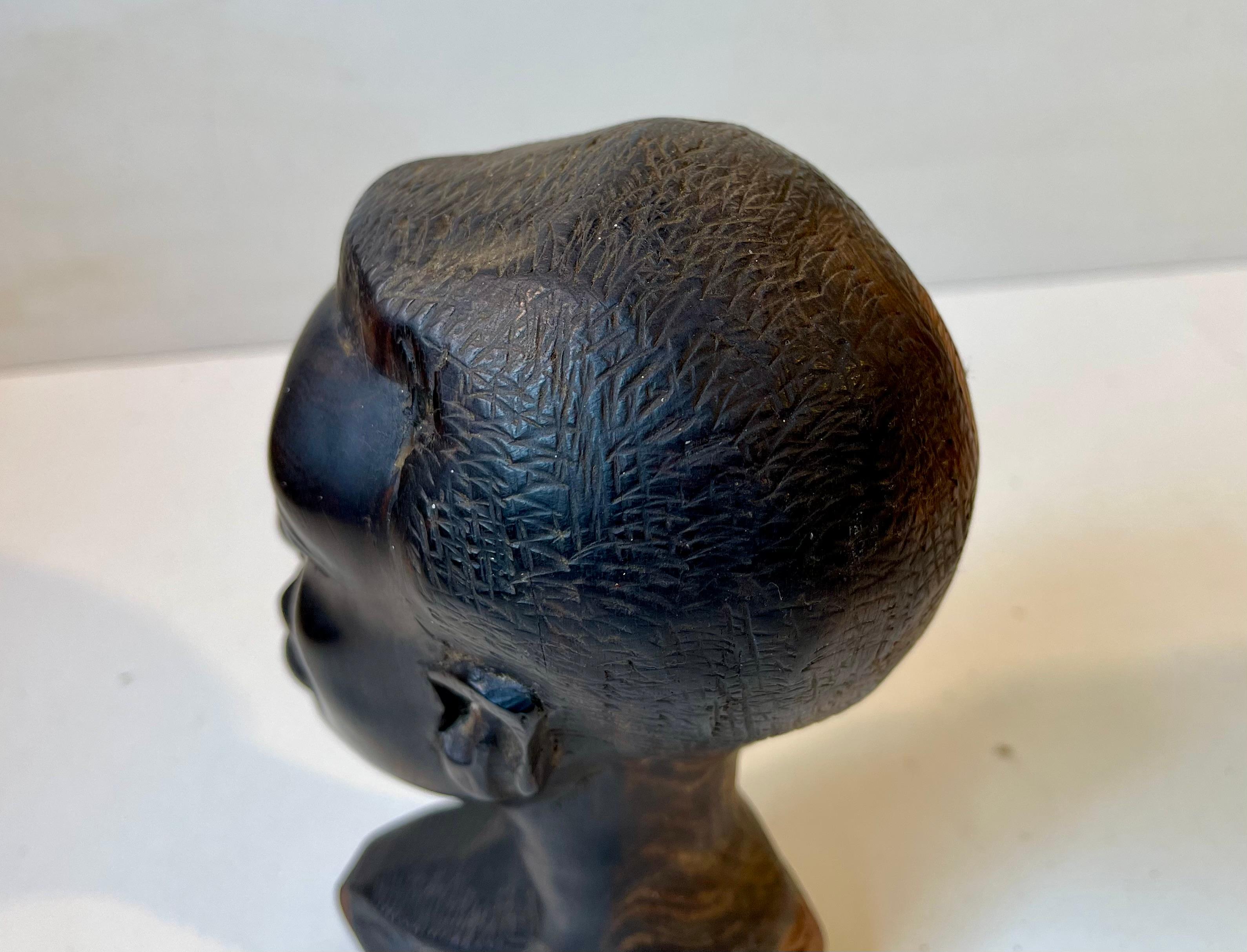 Hand-Carved Vintage African Head Bust in Hand Carved Black Wood For Sale