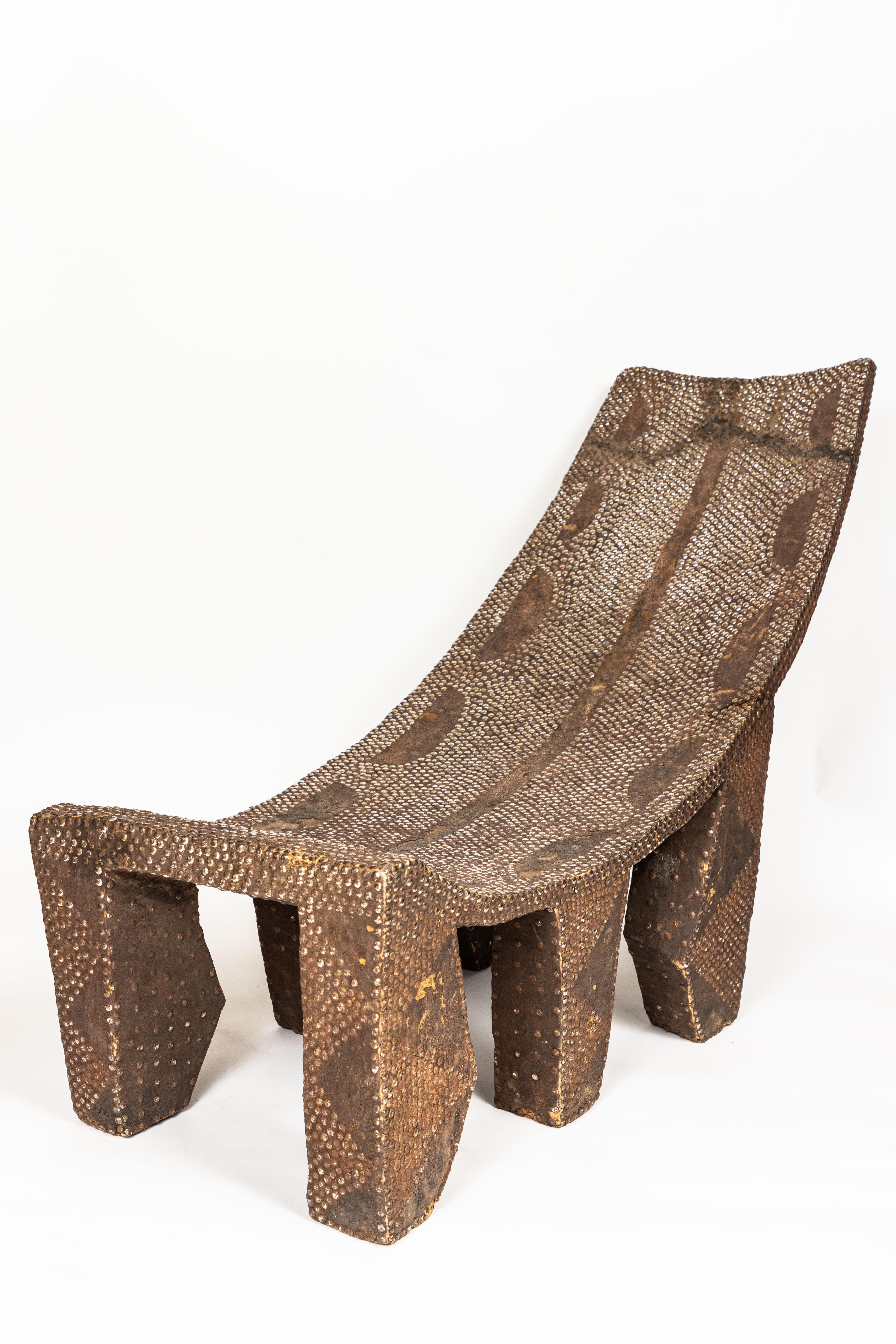 20th Century Vintage African Studded Wood Reclining Chair