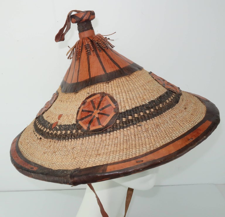 Vintage African Straw and Leather Pagoda Style Hat at 1stDibs african