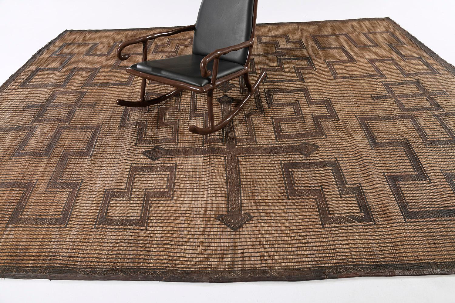 This exceptional and one-of-a-kind rug from the African Tuareg tribe features all the Berber symbols. Its natural color schemes of brown and gold were added to the uniqueness of this masterpiece. Ethnic modern interiors are most likely to be the
