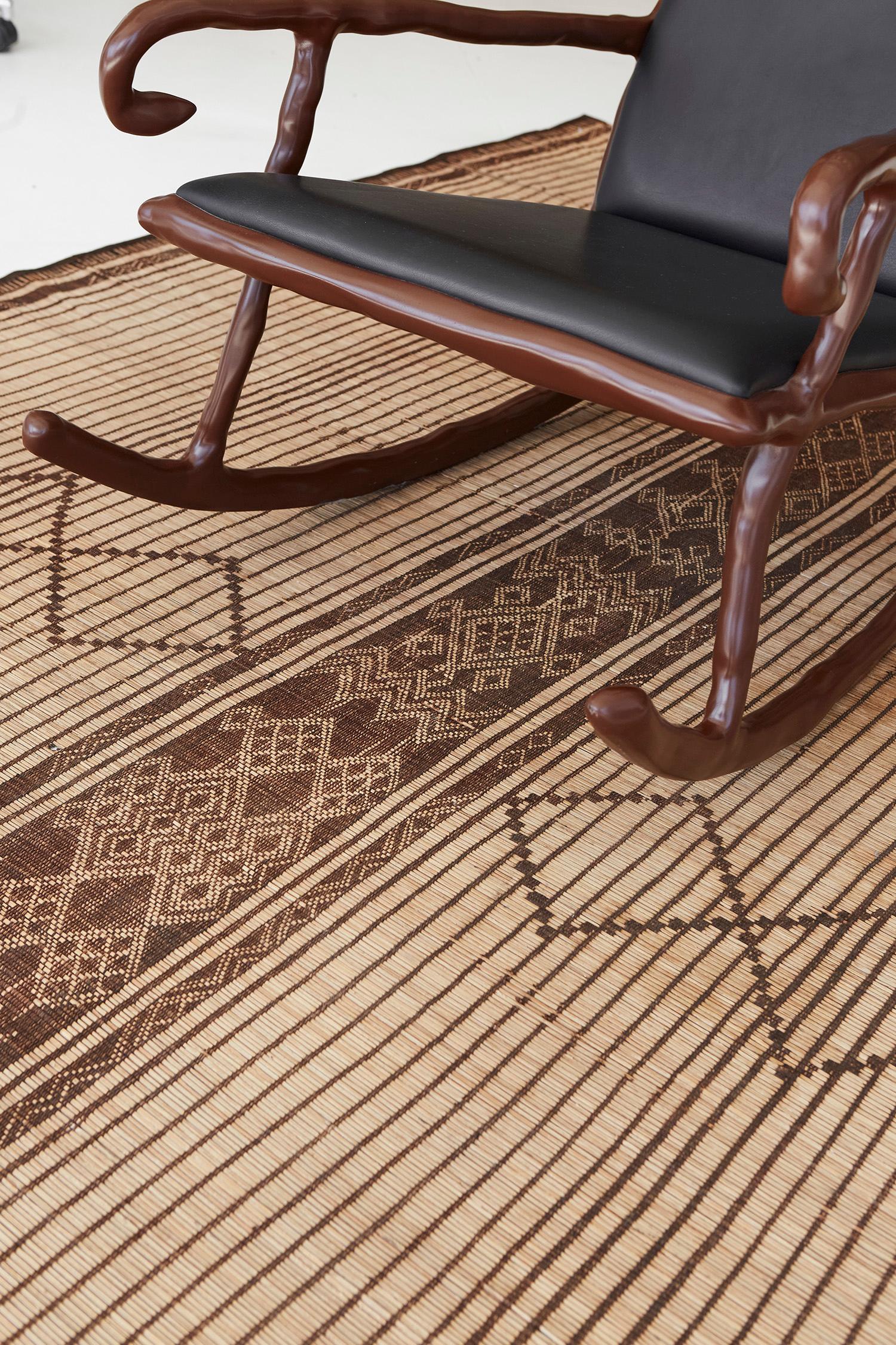 Embellish your room with so much history and sophistication with our Tuareg mat. It highlights the diamond patterns and Berber symbols on its core which these strong details brighten up the mood. Known for their durability, these are made from reed