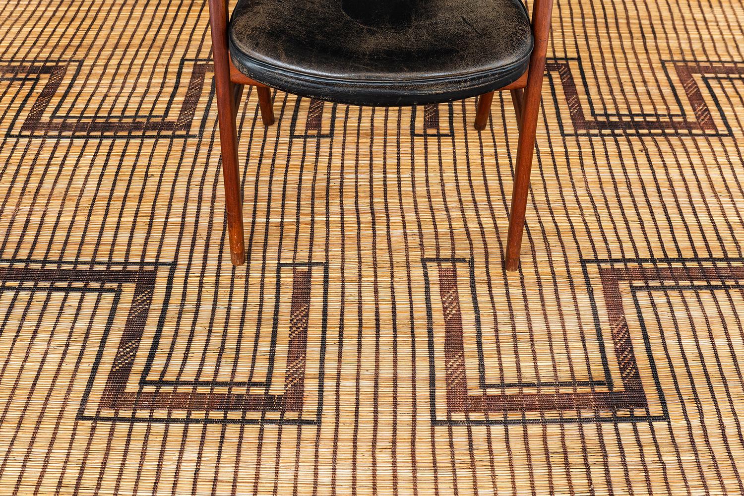 A beautiful and unique vintage Tuareg. This piece is handwoven of reed and leather by one of the oldest nomadic groups of the Saharan trade routes, the Tuaregs. This piece will elevate any design space with its tribal design and eyecatching texture.