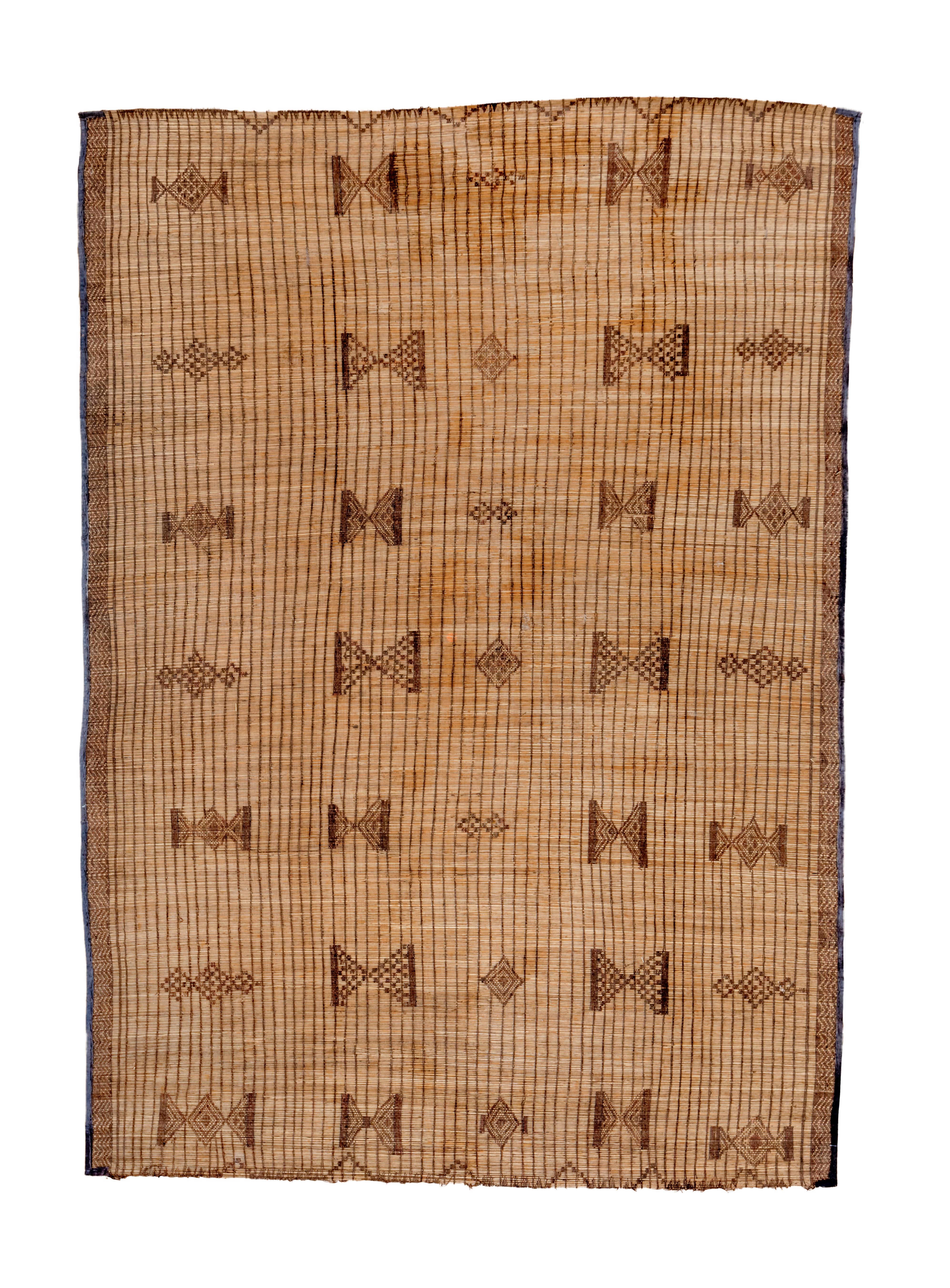 This all-natural flatwoven reed carpet is made by bundling up local reeds in golden tan, and adding shorter brown reeds to make double triangles and other lesser, similar geometric devices. End borders feature flattened triangles, while the narrow