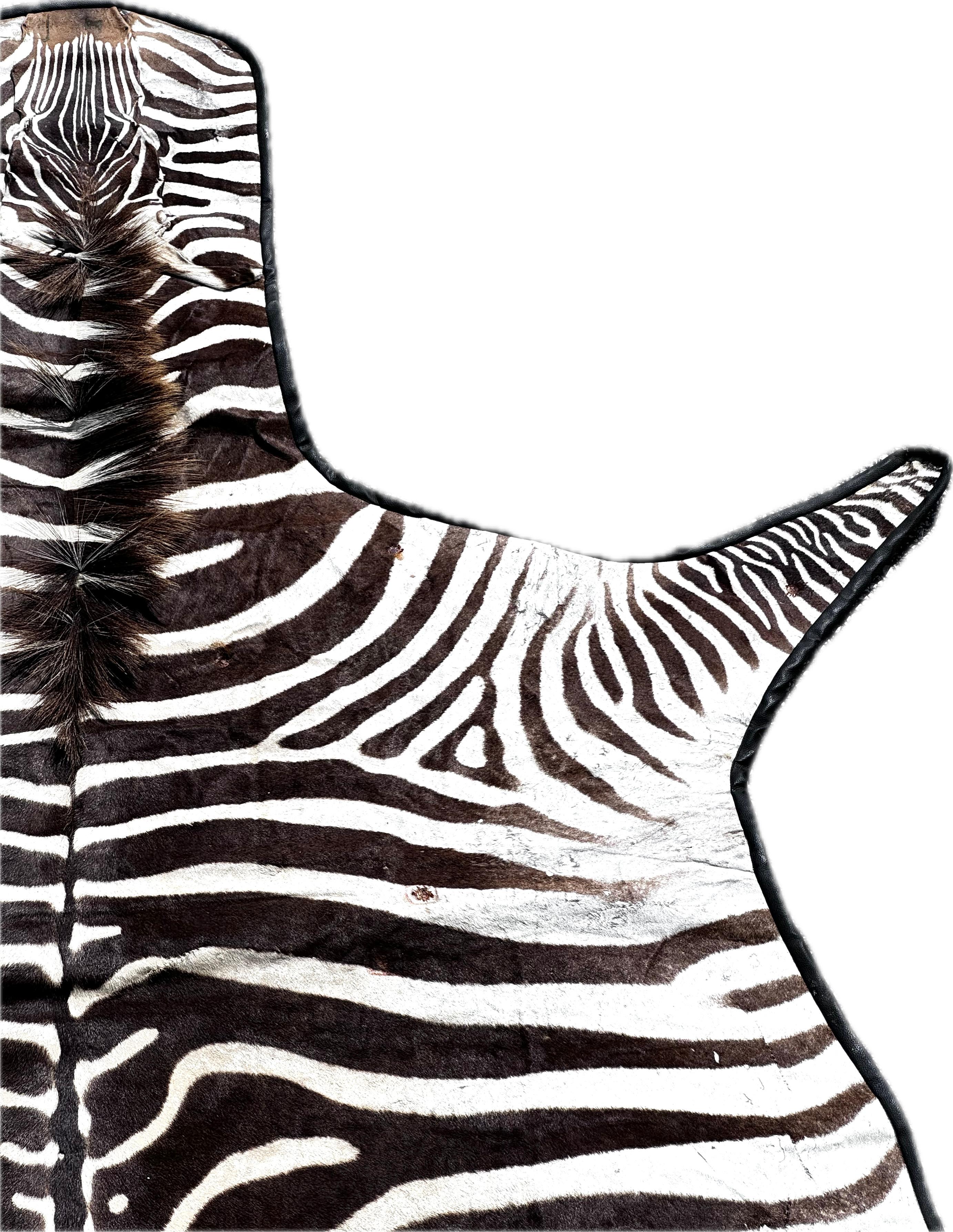 Beautiful real zebra hide rug. In vintage used condition. Great for any home. Awesome detail. A compliment to many rooms adding texture and sophistication in a Ralph Lauren safari inspired look.