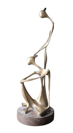 Scultura africanista d'epoca in ottone, firmata Mukendi, circa 1970