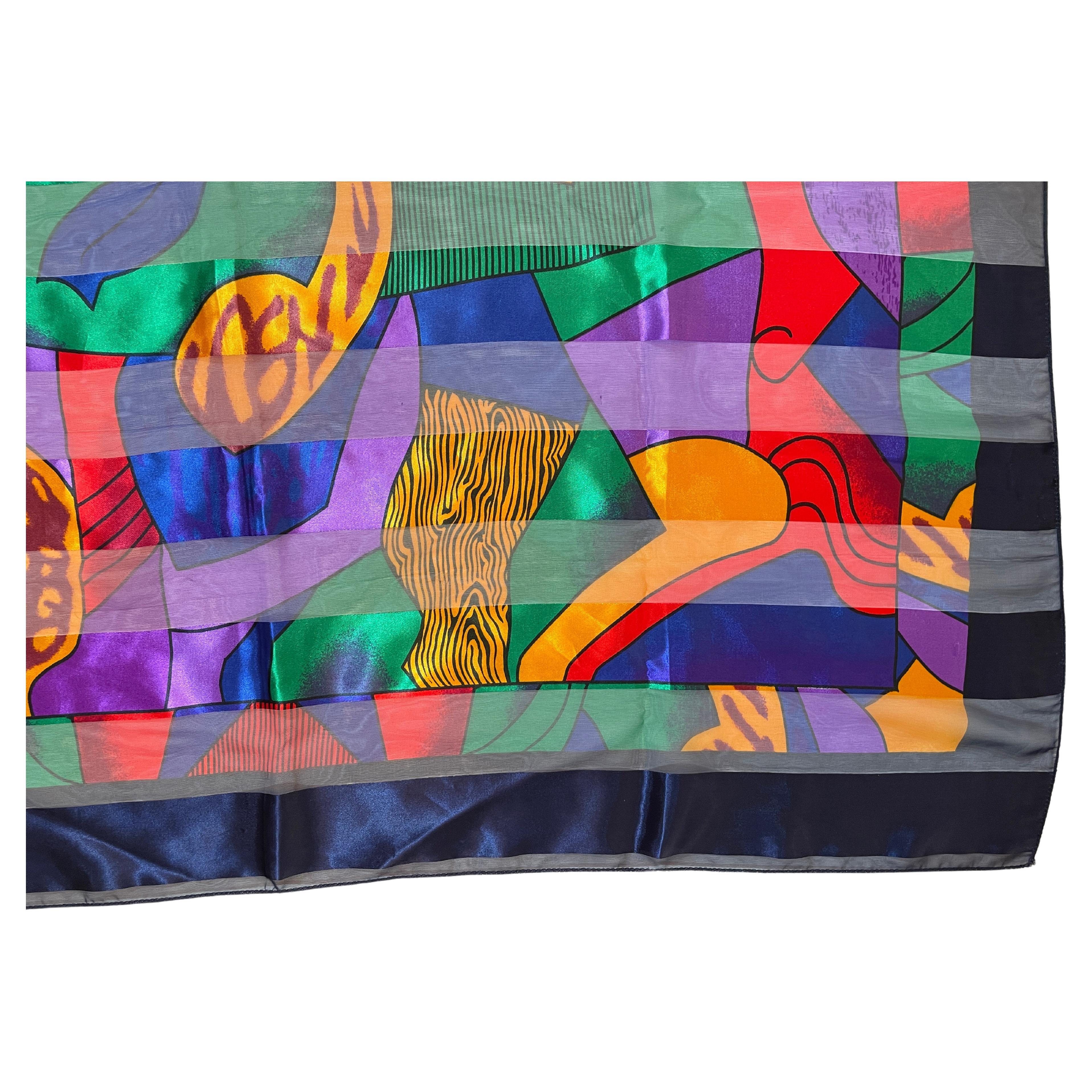 Vintage after Pablo Picasso Abstract Figural Scarf 1980s.
Dimensions: 40” x 40”.
This vintage Picasso silk scarf features one of his paintings which is a multi-color abstract cubist figural design.
Large Colorful Vintage Satin Scarf, Abstract Cubist