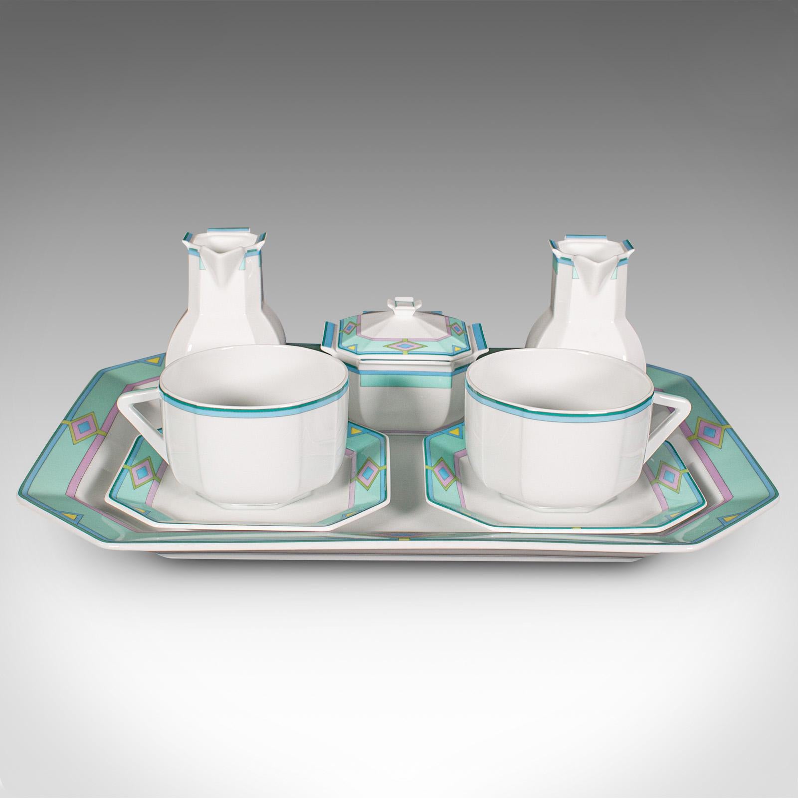 This is a vintage cabaret afternoon tea set. A French, ceramic serving tray and tea cups in Art Deco revival taste, dating to the late 20th century, circa 1990.

Striking and temptingly colourful tea set, a treat for the lounge
Displays a desirable