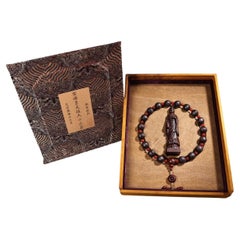 Bracciale vintage in legno di agar con ciondolo di Buddha - Gioielli spirituali artigianali