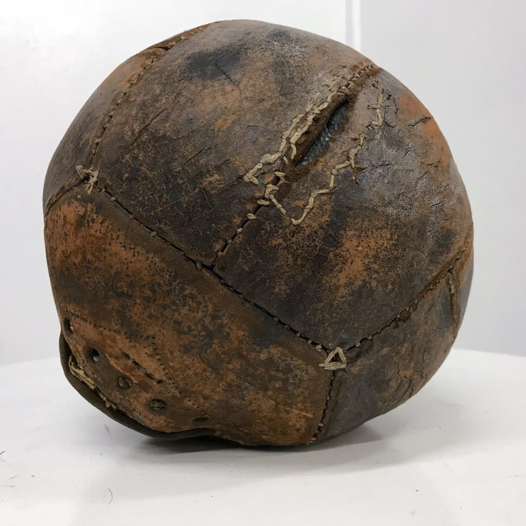 Vintage medicine ball in great patinated leather features double stitching a very distressed collectible of sports art memorabilia.
See inside contents filled with vintage newspaper clippings.
Featuring tons of charm and character.
Original
