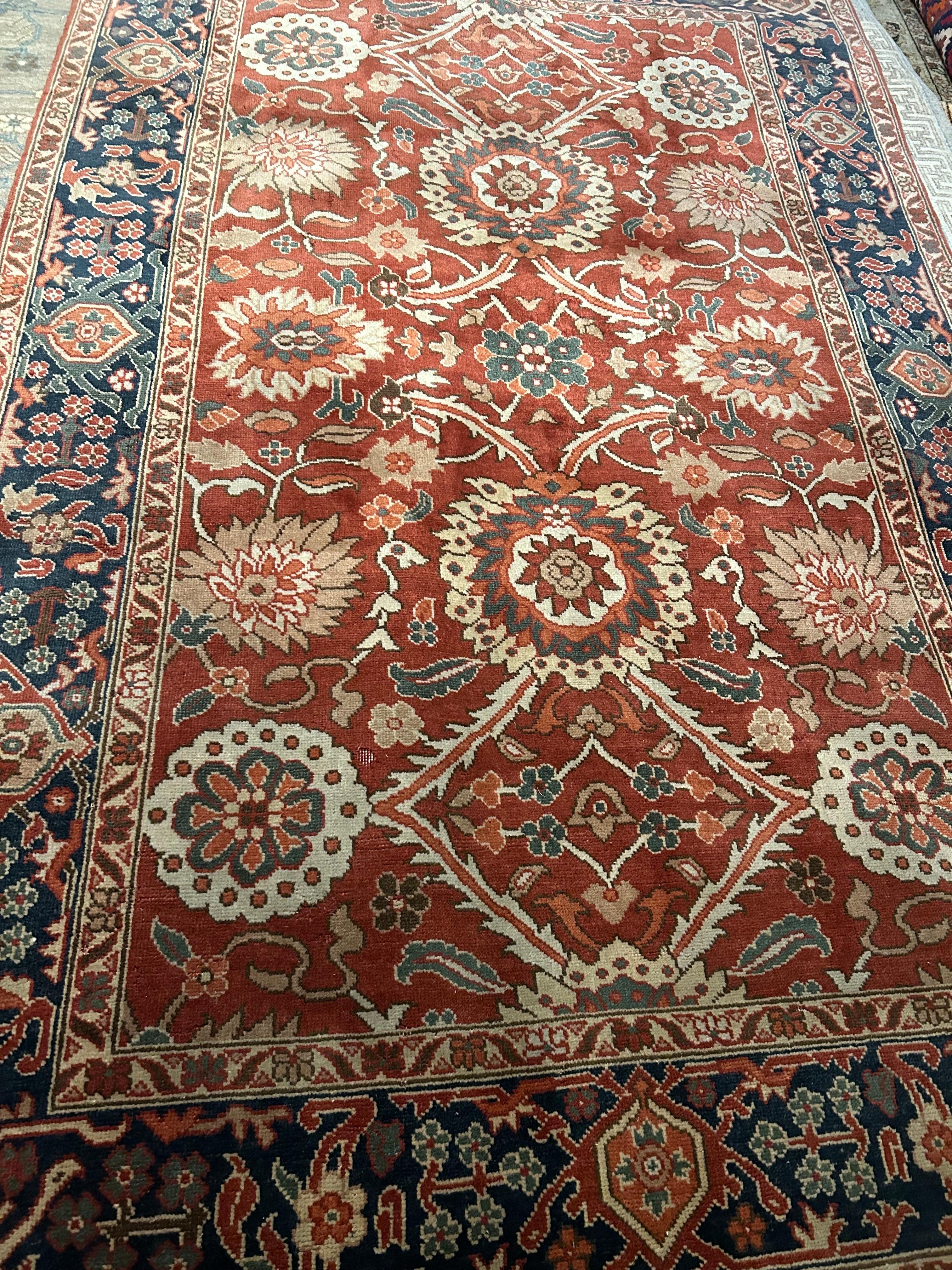 Indian Vintage Agra Pure Wool Hand Knotted Rug In Rust Hues And Warm Tones For Sale