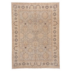 Tapis Vintage Agra Fond sable et taupe avec médaillon floral curviligne