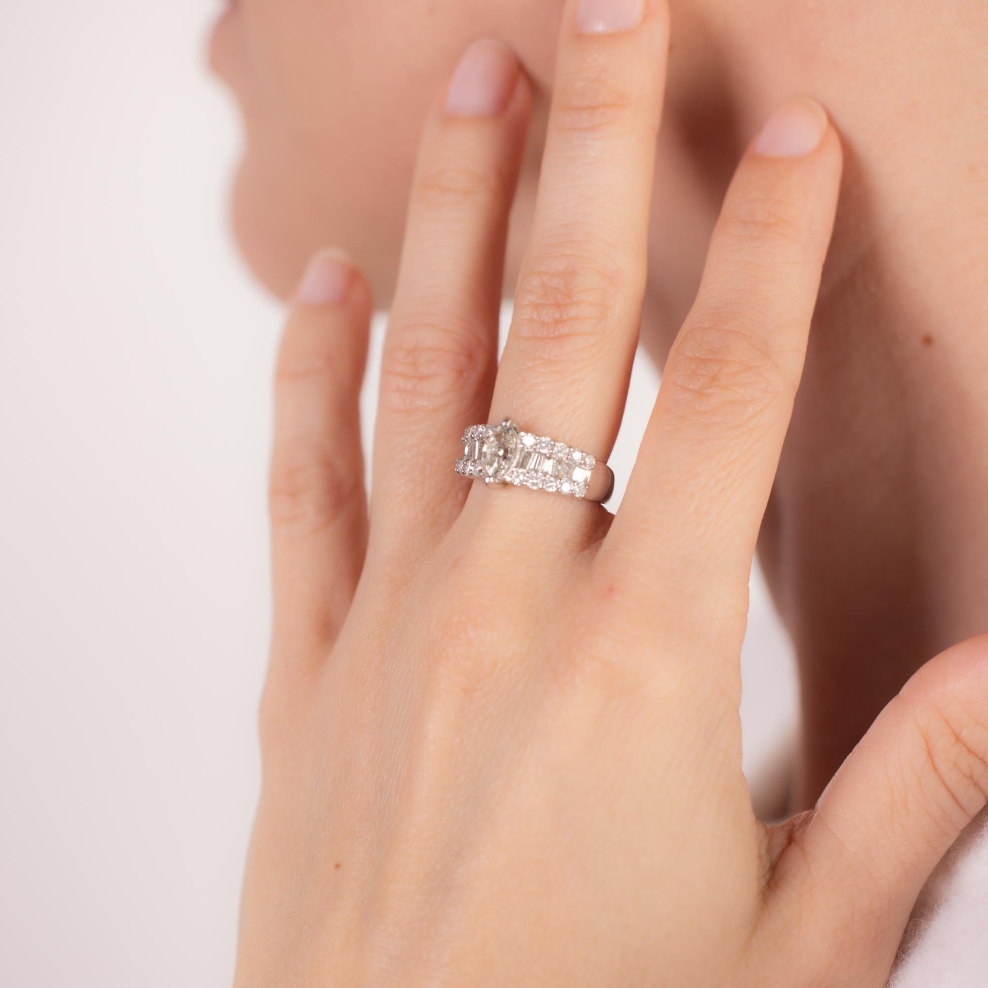 Marquise Cut Vintage AIG 1.84 carats total weight diamond platinum ring For Sale