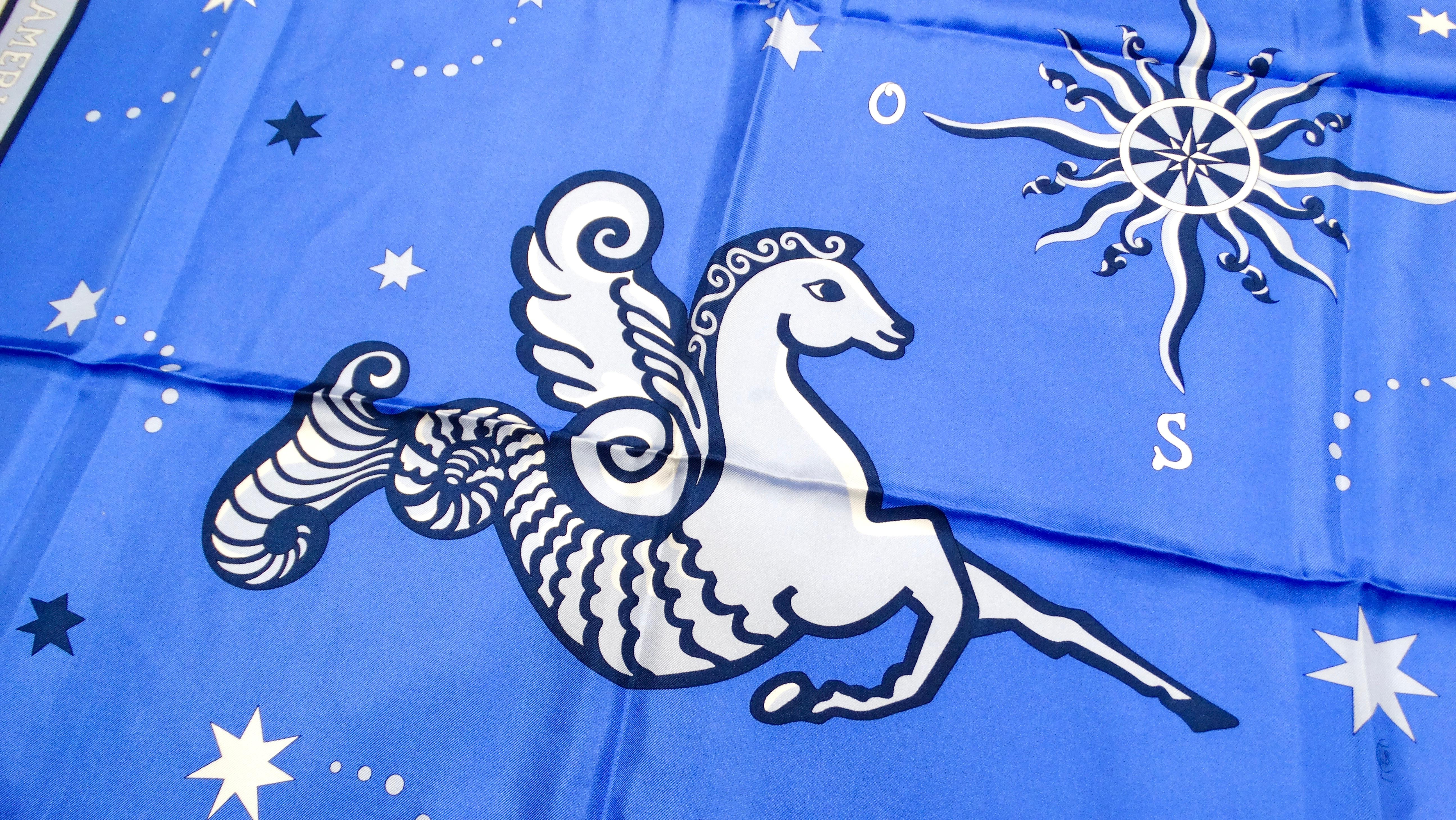 Introducing the Vintage Air France Blue & White Hippocampus Print Silk Scarf, a stunning accessory that seamlessly blends mythology and sophistication. At its center, a beautifully depicted hippocampus soars through a serene blue sky, surrounded by