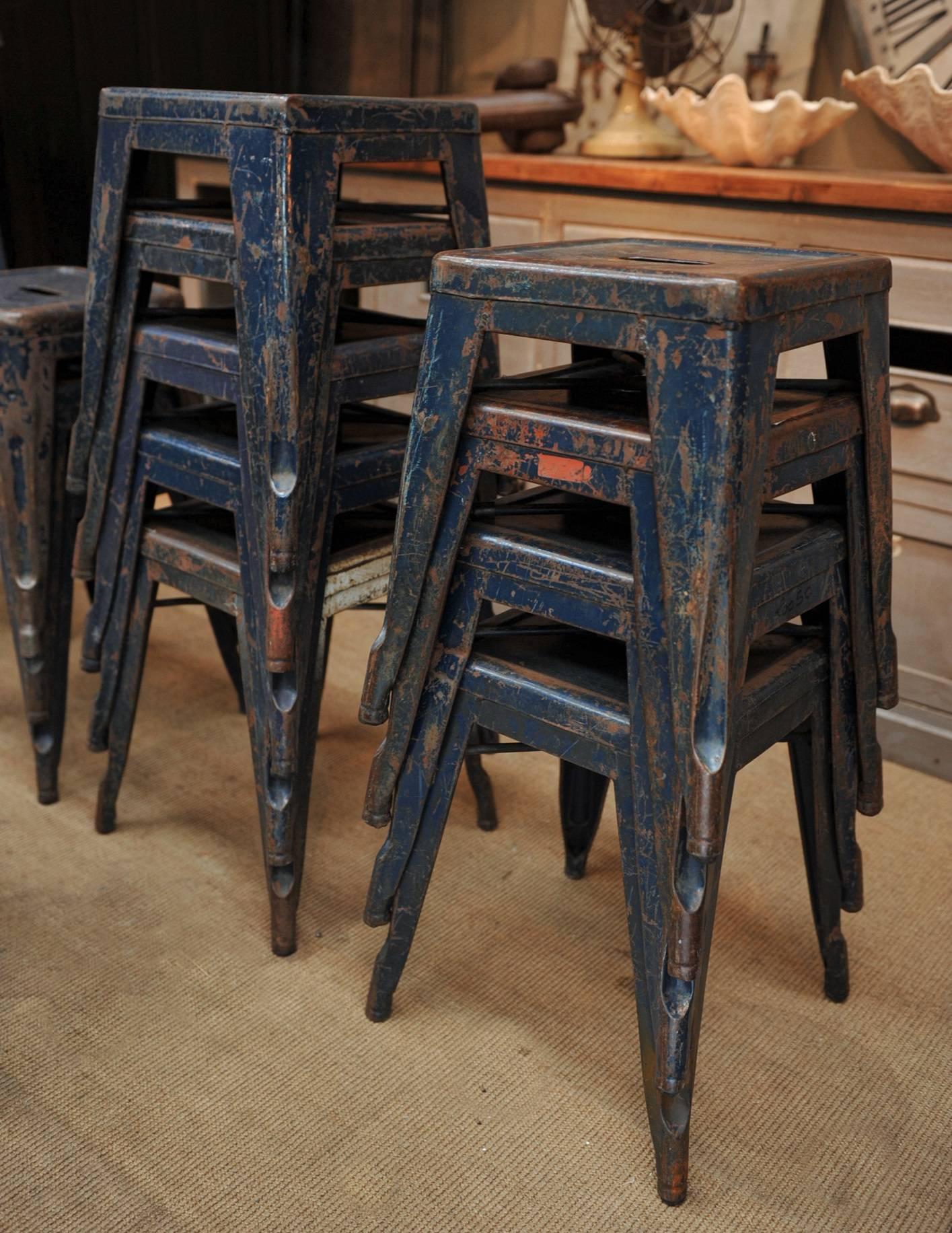 Stackable 1950s Air French Army Tolix stools 1950s original used blue color with old French Army stamp under each seat. Available 12 pieces.


 