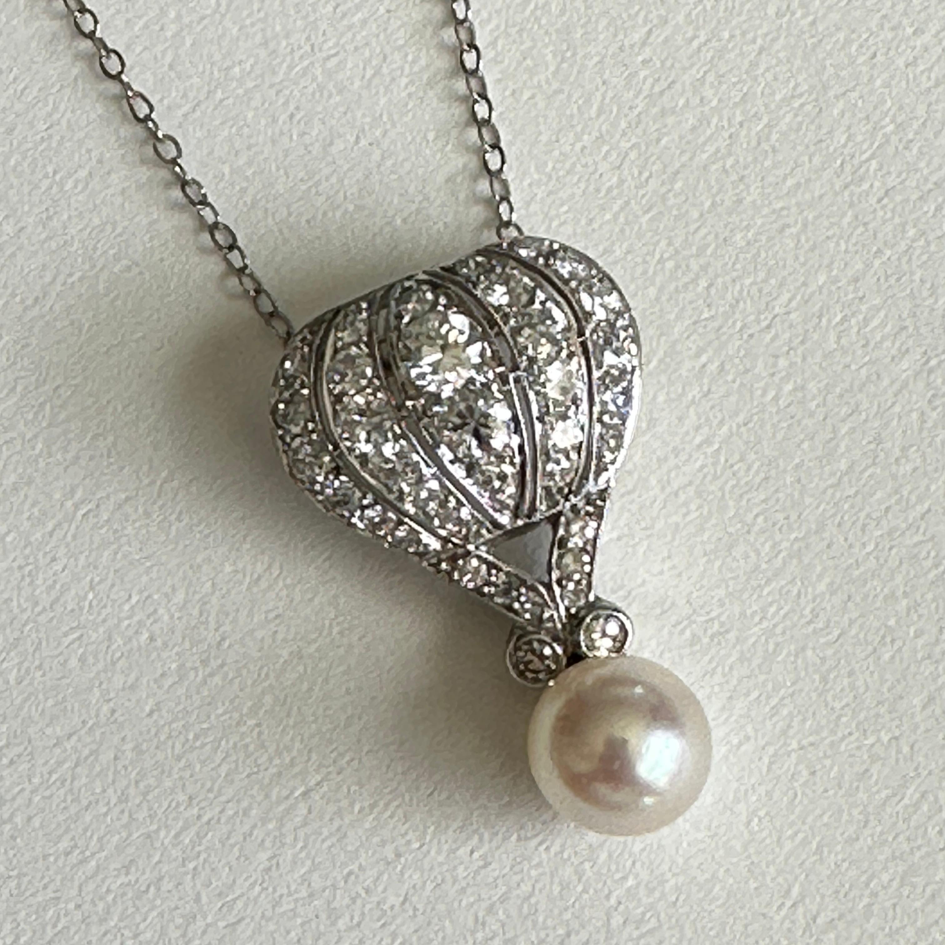Details:
The sweetest hot air balloon pendant in white 14K gold, with a pearl basket! A mid-century vintage piece likely from the 1940's-1950's. The balloon is encrusted with diamonds. This piece is very sweet and would be a great addition to your