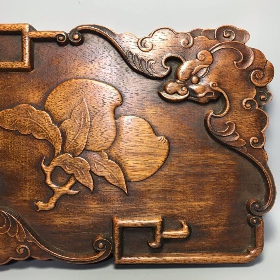 Vintage Asian Wooden Carving Longevity Bats and Peaches Tea Plaque – A Symbol of Prosperity and Long Life

This Vintage Asian Wooden Carving Tea Plaque features an exquisite hand-carved design of longevity bats and peaches, both revered symbols of
