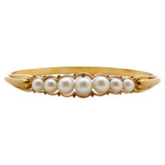 Bracelet jonc vintage Akoya en or 14 carats et perles