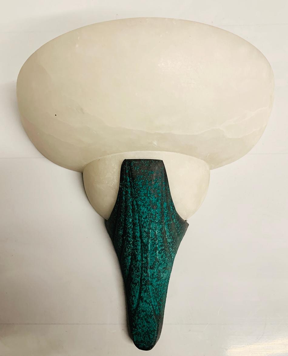 Beautiful and unique wall sconce made in Italy.
The piece is made in Alabaster with copper beak that ressembles a goose head.

The piece us in good vintage condition, hard wired, UL Listed and ready to be installe.

Measurements:
10 inches