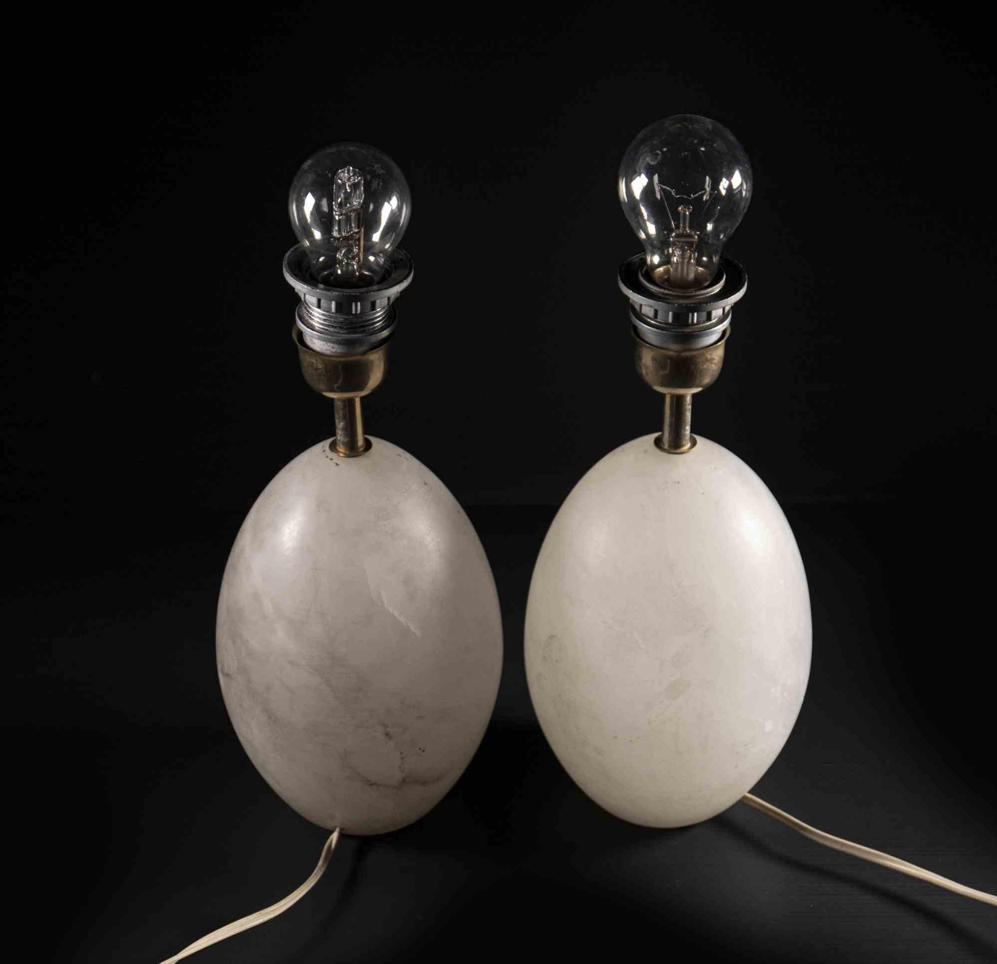 Alabaster Lamps is an original pair of design lamp items realized in Italy in the 1970s.

A very elegant couple of lamps realized in alabaster.

Good conditions except for some minor scratches. No lampshade.