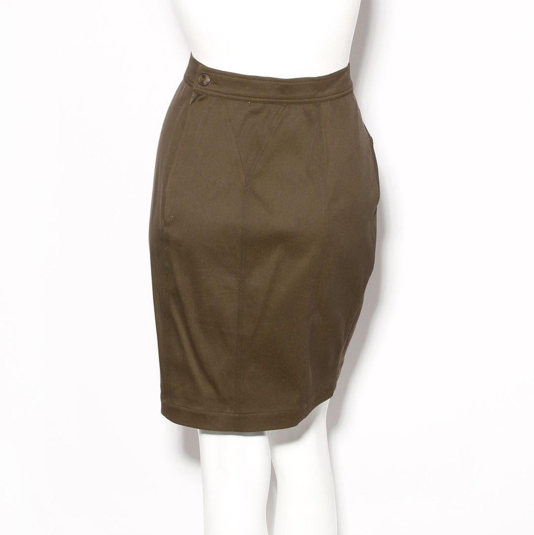 Product Details:
Vintage skirt by Azzedine Alaia
Olive green
Decorative seams 
High waisted skirt
Zip back and button closure 
Made in France
Condition: Excellent vintage condition, little to no visible wear. Sold as-is (see