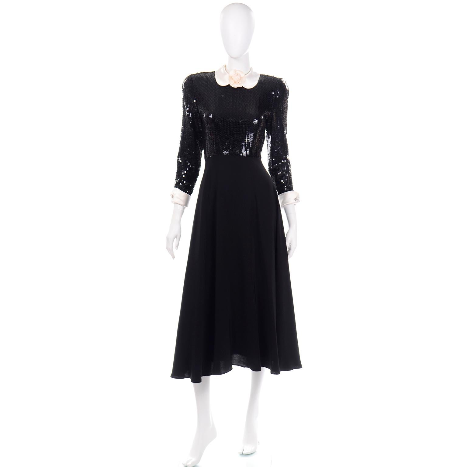 This elegant vintage Albert Nipon black sequin dress would be a great piece to wear to any special evening event! We think that Albert Nipon dresses are so well made and we tend to grab them whenever we see them! The bodice of the dress is covered
