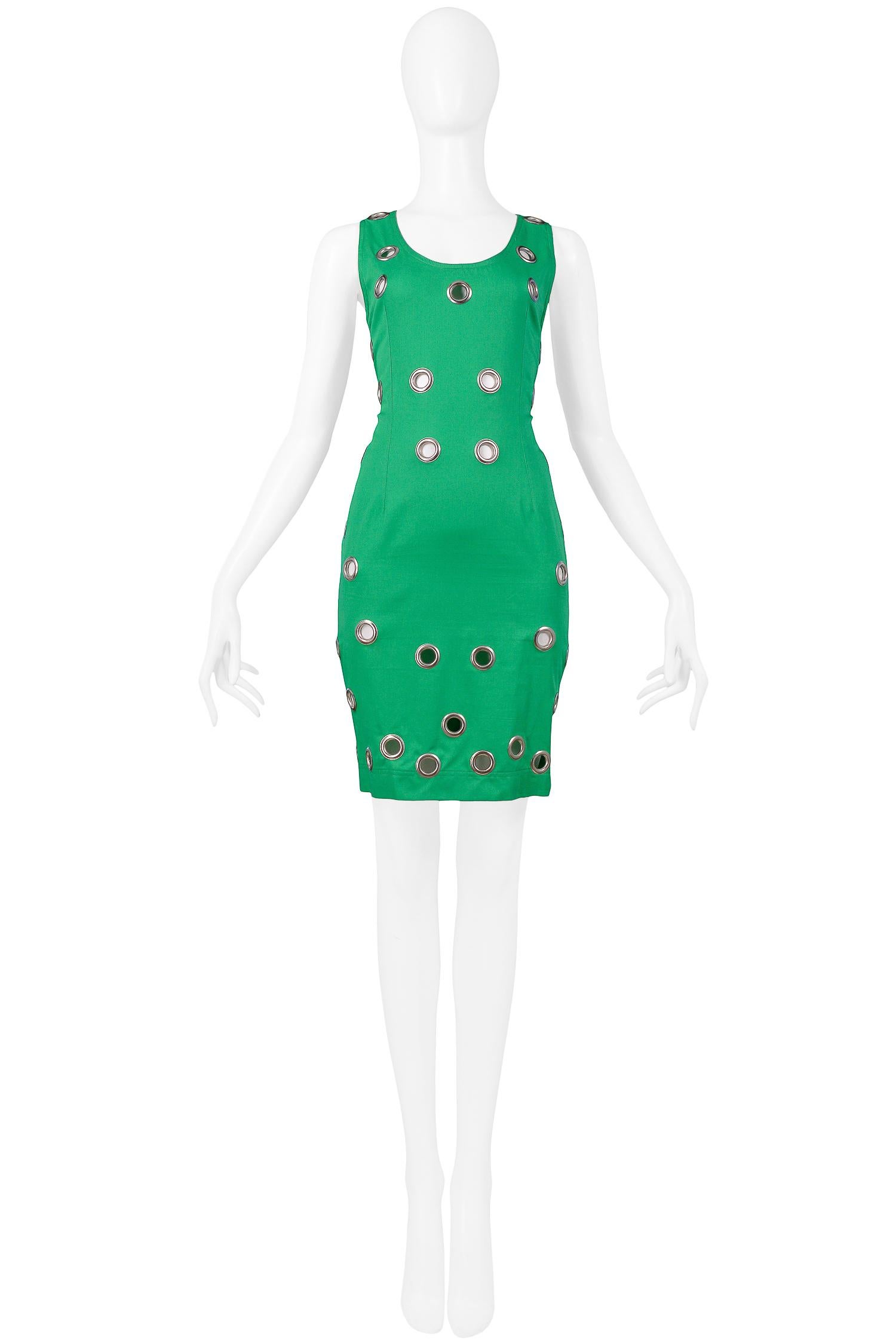 Resurrection Vintage is excited to offer a vintage Alberta Ferretti bright green sleeveless shift dress with large silver grommets throughout and center back zipper closure.

Alberta Ferretti
Size 40
Excellent Vintage Condition
Authenticity