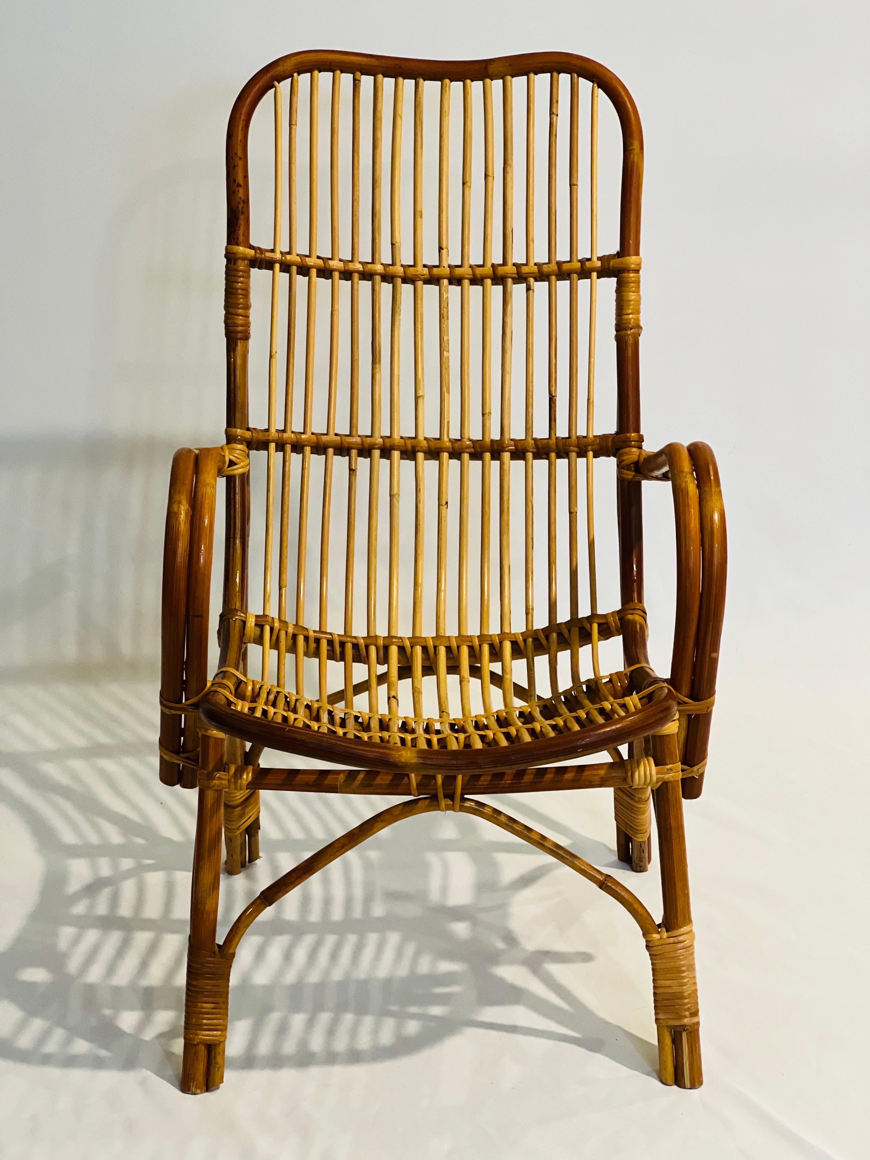 Vintage Albini style bamboo and rattan child's lounge chair.

Adorable chair with classic boho chic vibes perfect for your little one to lounge in style. The chair is sturdy and in very good condition.