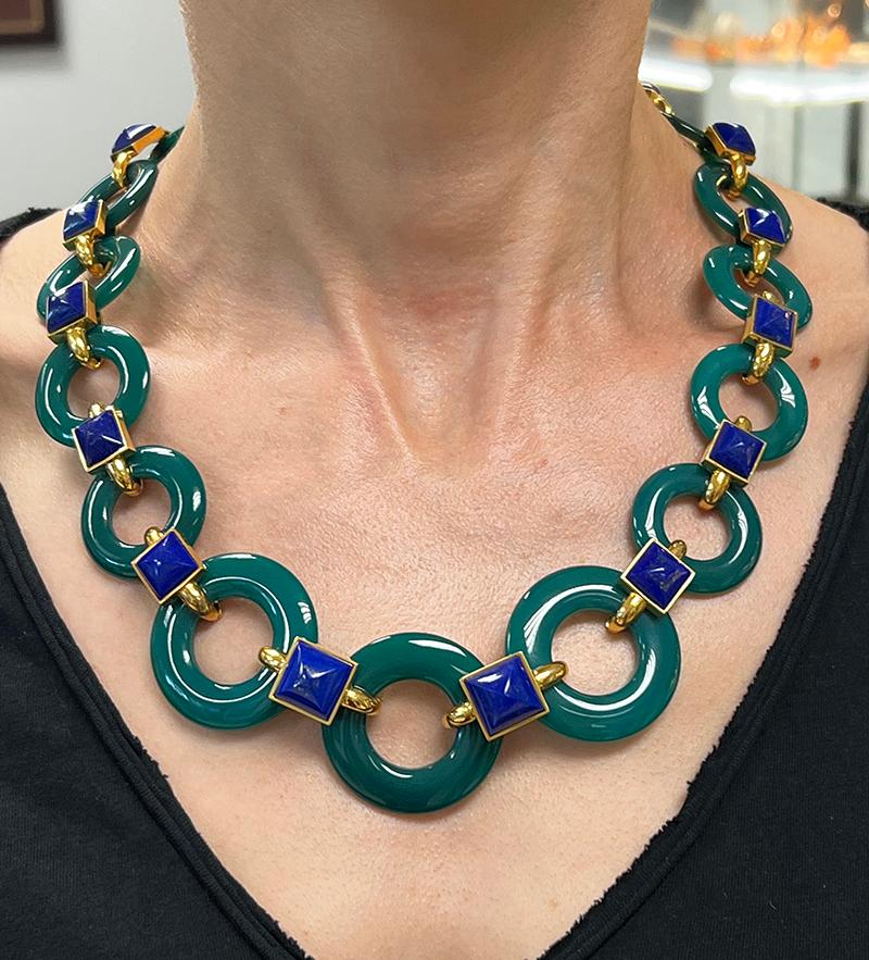         A stunning vintage Cipullo chrysoprase, lapis lazuli and 18 karat yellow gold necklace.
It comprises of round chrysoprase links connected by gold and lapis lazuli elements.
	The chrysoprase links come in graduated size, smaller on top and