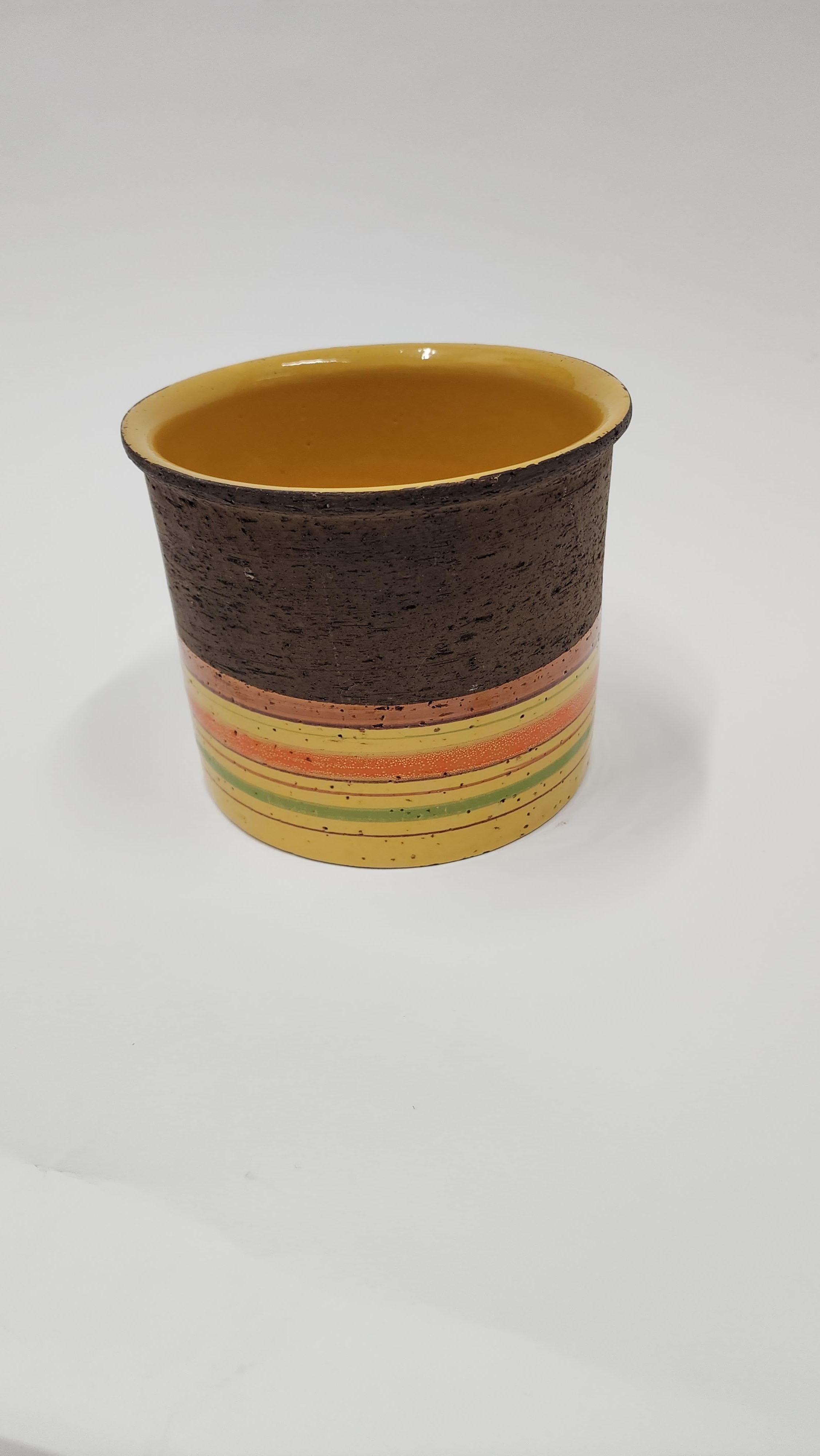 Beautiful brown, yellow, orange and green striped planter.  Designed by Aldo Londi for Rosenthal Netter, made in Itally.  large version available in separate listing.